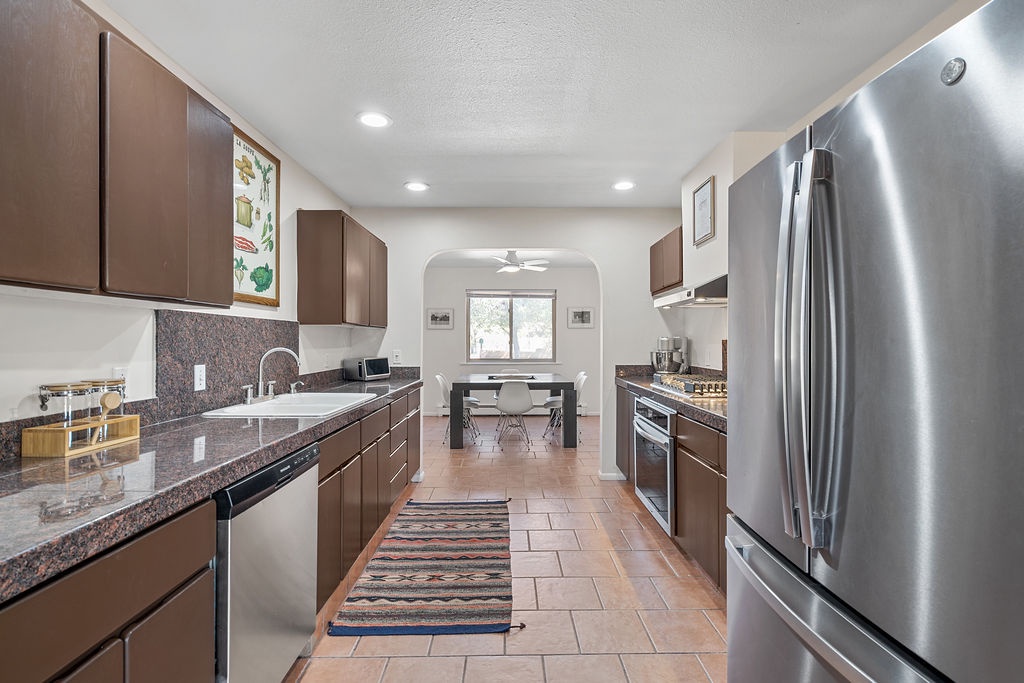 Your fully-equipped galley kitchen features modern appliances and granite countertops, perfect for preparing meals during your stay.