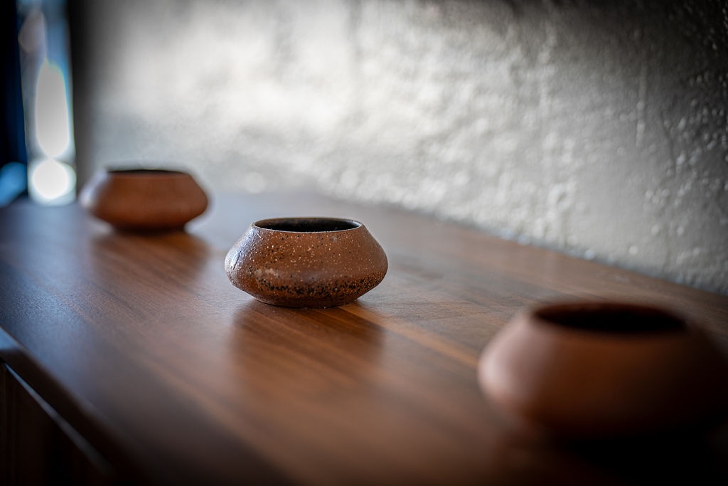 Handcrafted pottery adds artisanal charm to your dining space, creating a warm atmosphere for memorable meals.