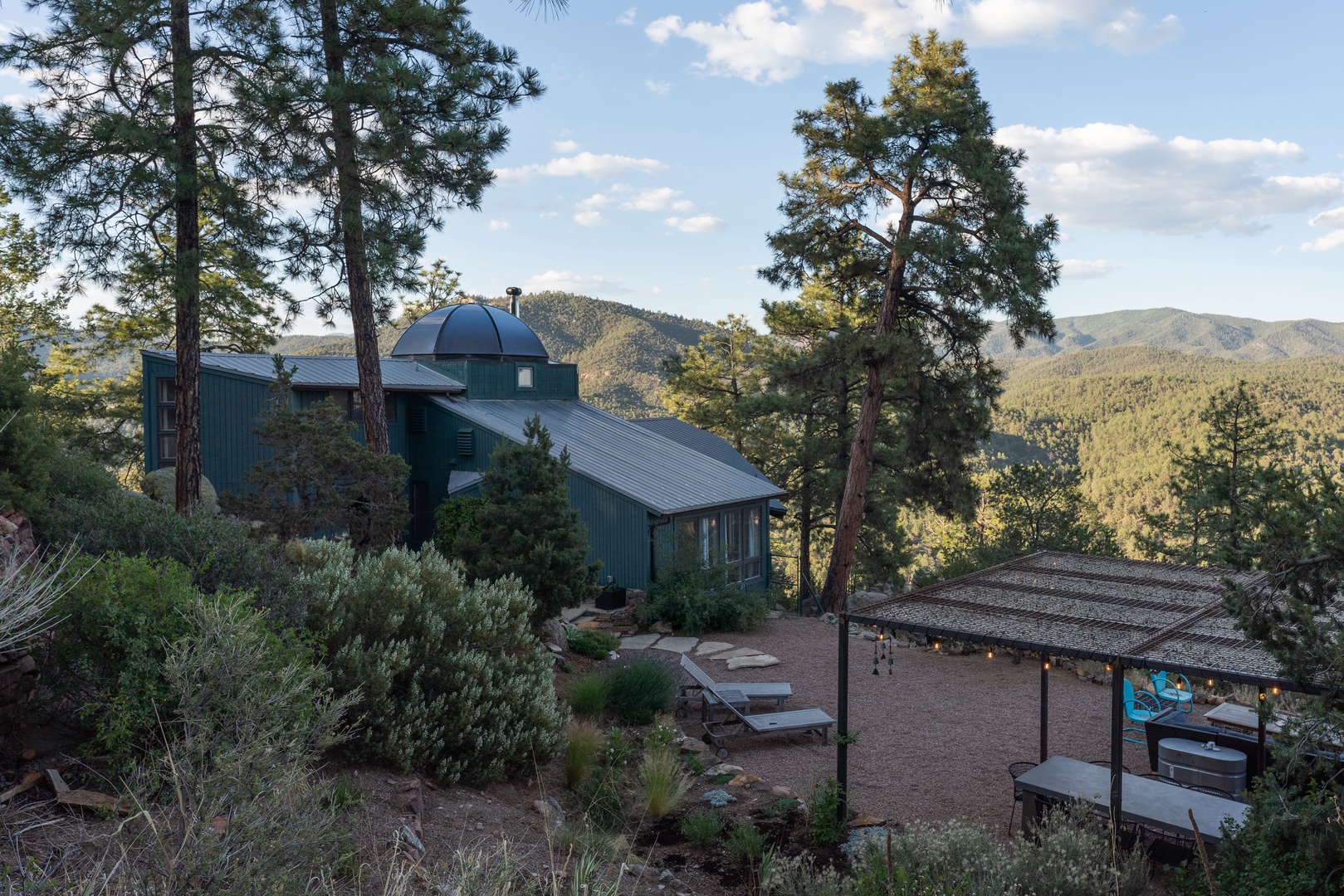 Secluded mountain retreat with private outdoor amenities.