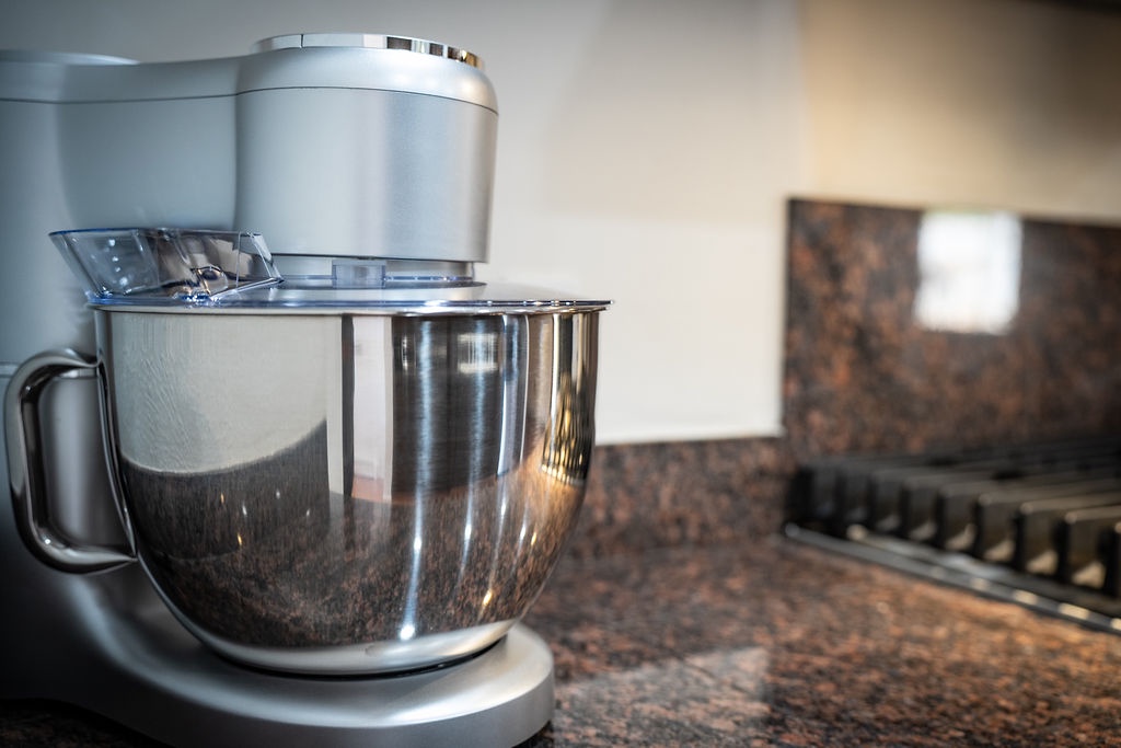 Your fully equipped kitchen awaits with professional-grade appliances, making meal prep a breeze during your stay.