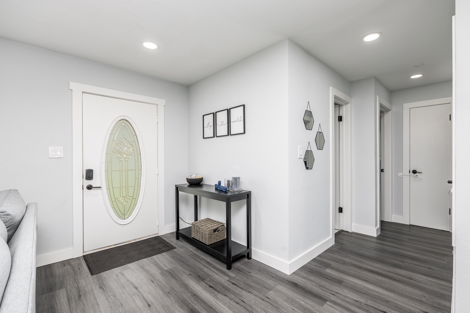 Step into your bright, welcoming entryway with stylish modern touches and thoughtful decor that sets the tone for your stay.