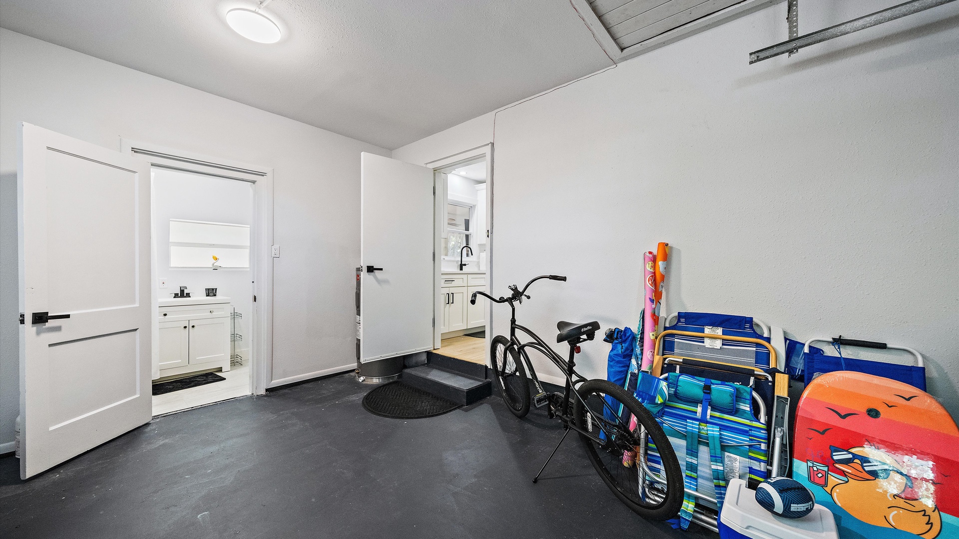 Store your beach gear and bikes in the dedicated storage area, keeping everything organized for your seaside adventures.