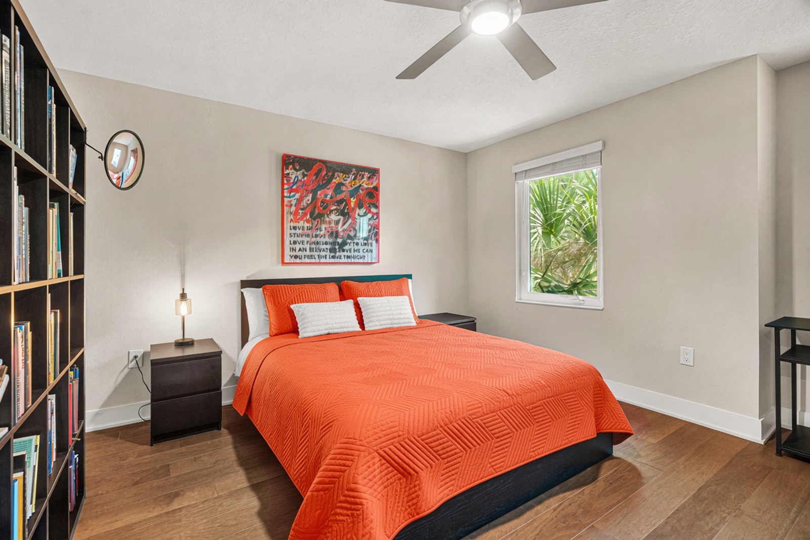 Unwind in your vibrant bedroom with hotel style linens and cozy queen bed. Bedroom includes a desk and gaming area.