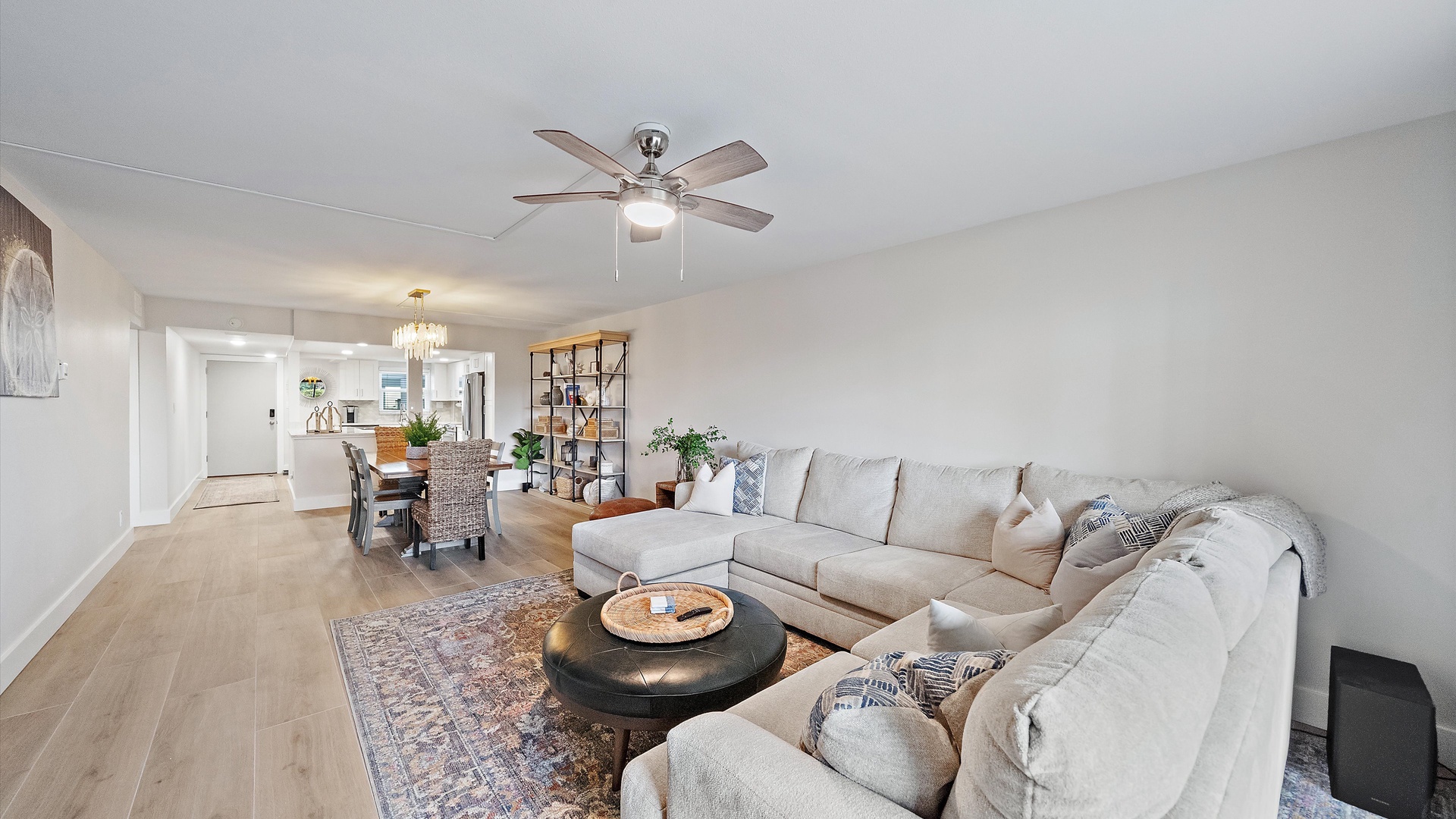 Sink into the plush sectional sofa where you can unwind after exploring the city, with thoughtful touches throughout this bright, airy space.