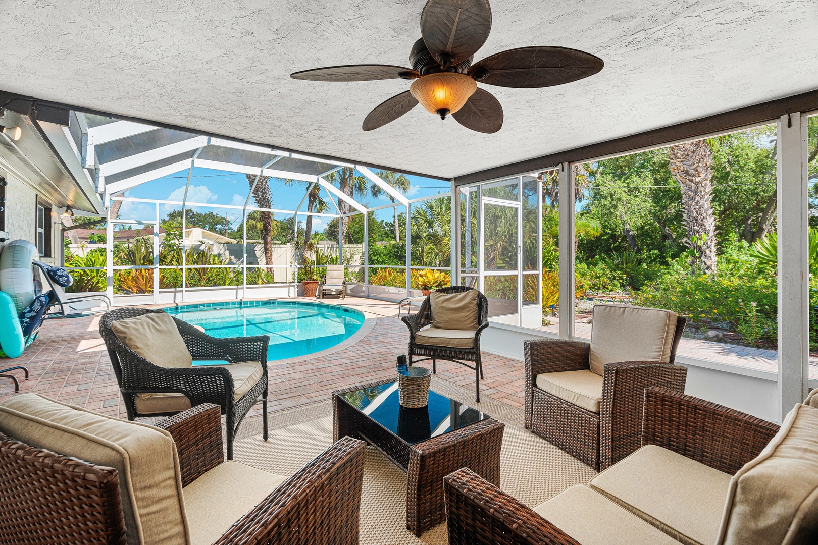 Step into your private screened-in lanai, where a sparkling pool awaits beneath the Florida sunshine.