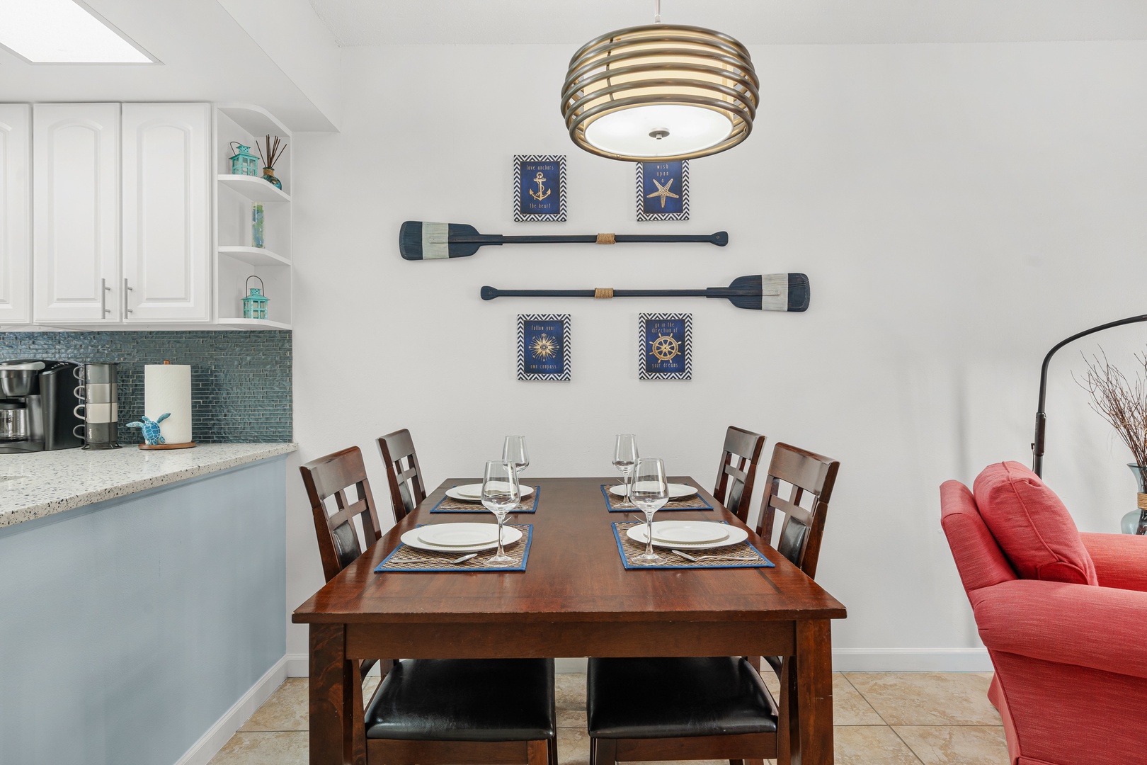 Gather around your elegant dining table where nautical charm meets modern comfort, perfect for memorable meals together.