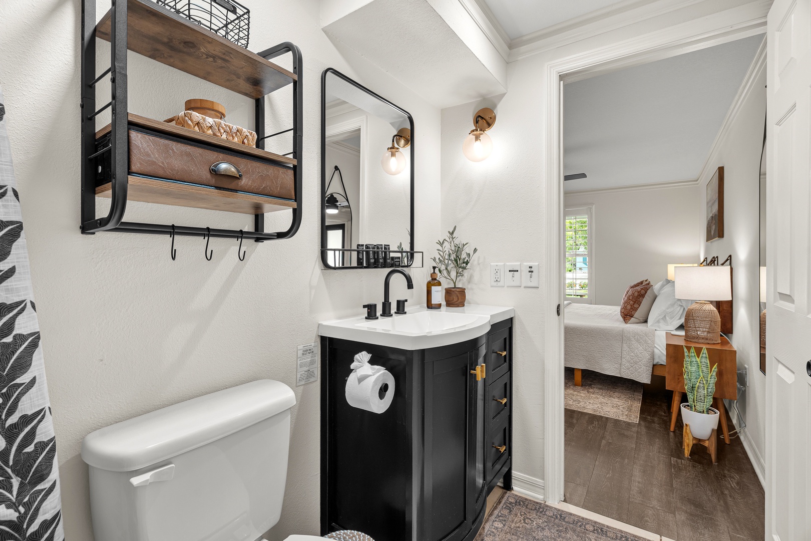 Freshen up in your stylish bathroom with modern fixtures and thoughtful design. The chic vanity, soft towels, and warm lighting create a welcoming space where you can start and end each day in comfort.