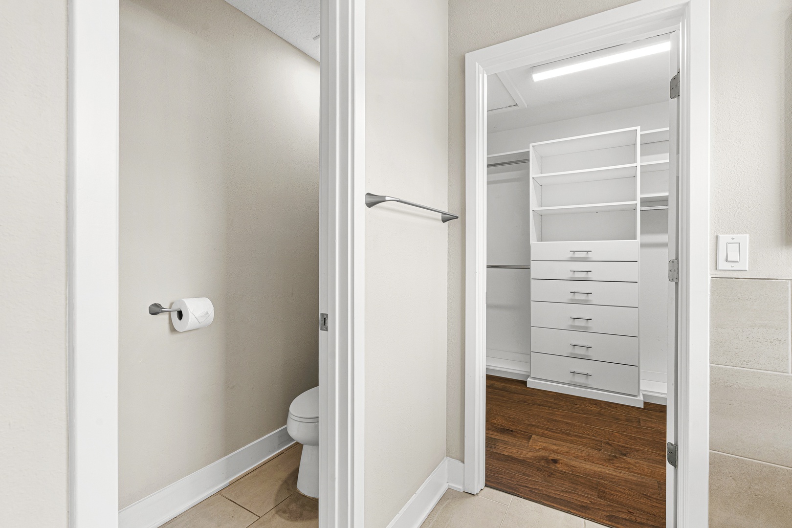 Walk into your very own organized closet, beautifully outfitted with built-in storage that keeps your wardrobe at your fingertips. Clean lines and bright lighting make mornings easy and stress-free.