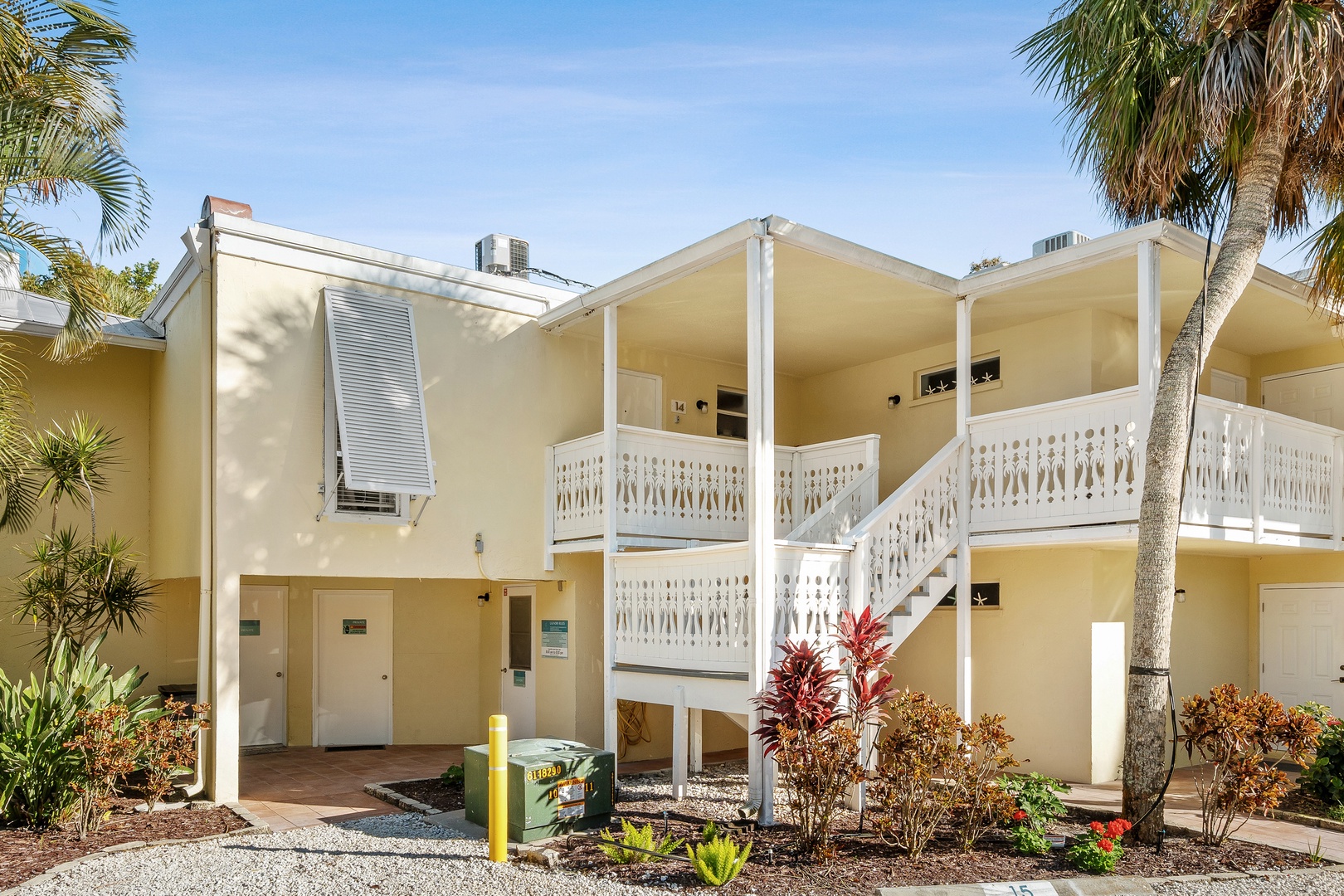 Exterior view of the second-floor Beach Castle condo. Laundry room available just below the unit.