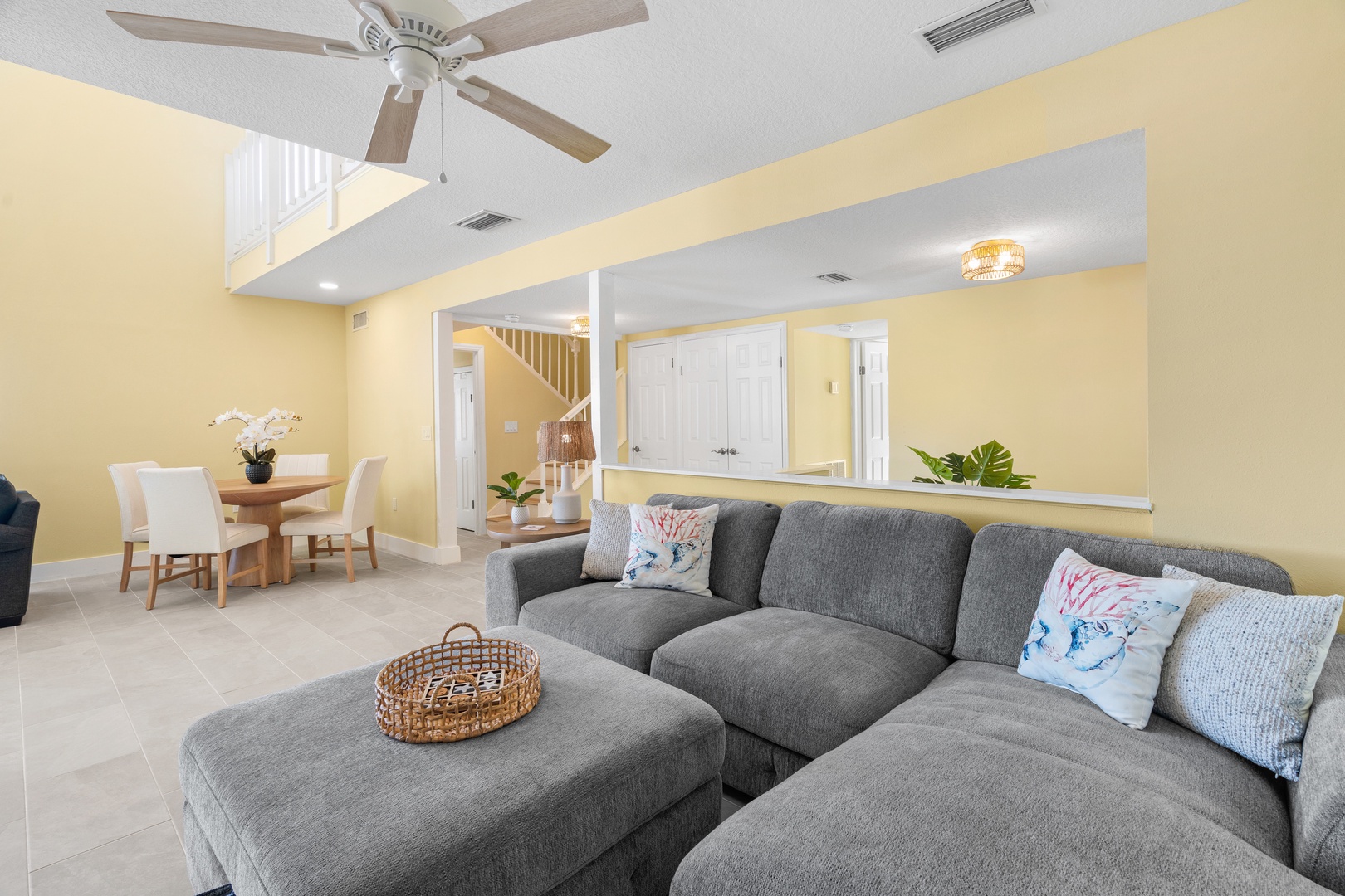 Sink into this spacious sectional sofa where you'll love relaxing with tropical touches throughout your bright, airy retreat.