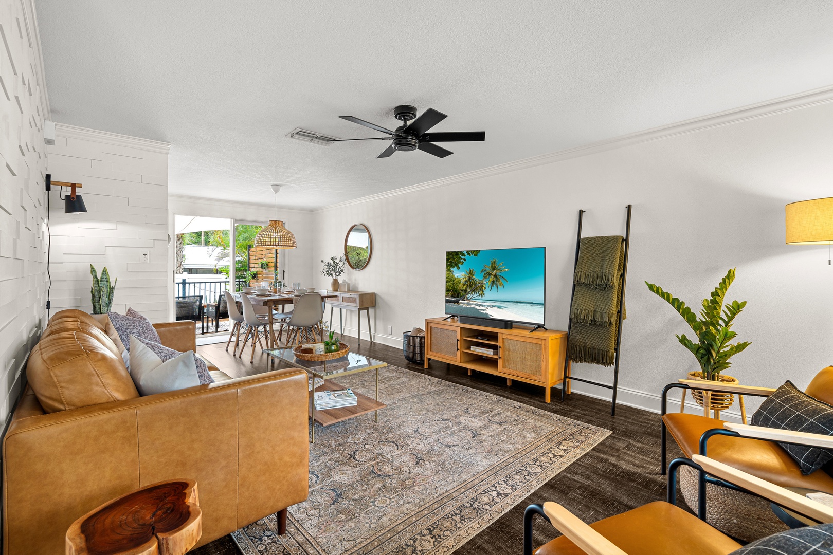 Picture yourself unwinding in this bright, airy living space where modern comfort meets coastal charm. The open layout flows seamlessly to your private balcony, inviting you to relax after exploring paradise.