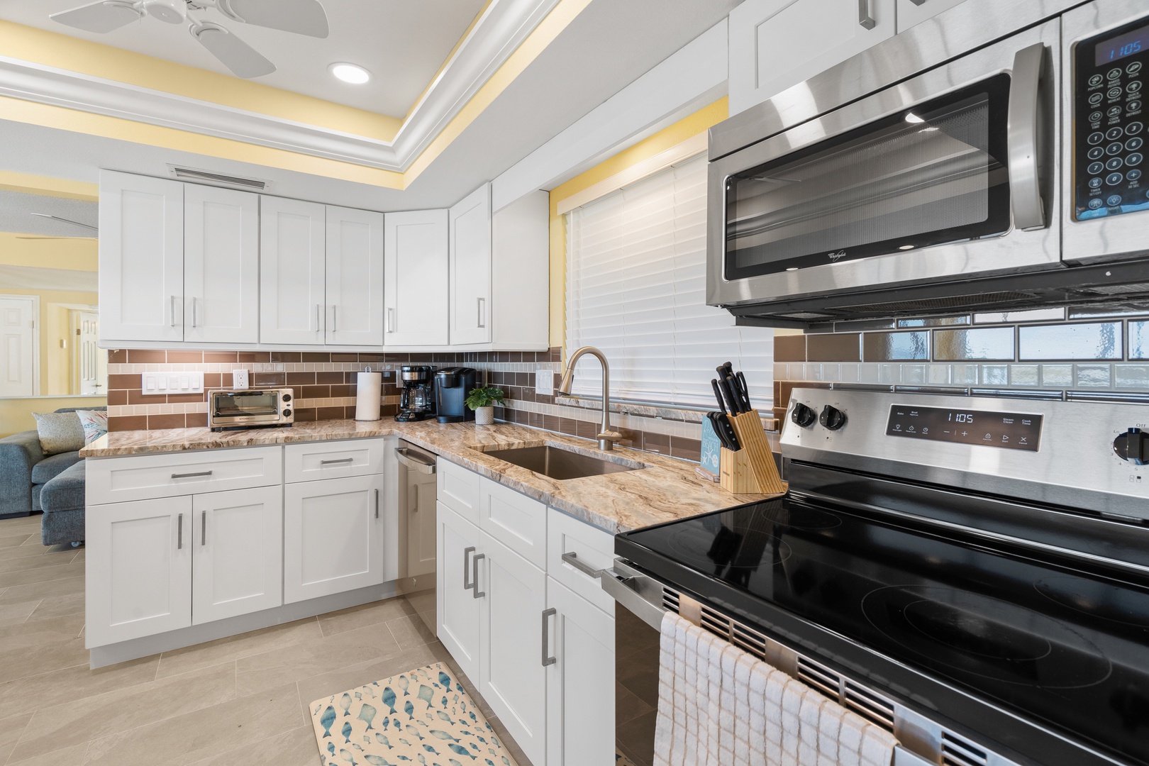 Your fully equipped kitchen features granite countertops, modern appliances, and everything you need to create memorable meals during your stay.