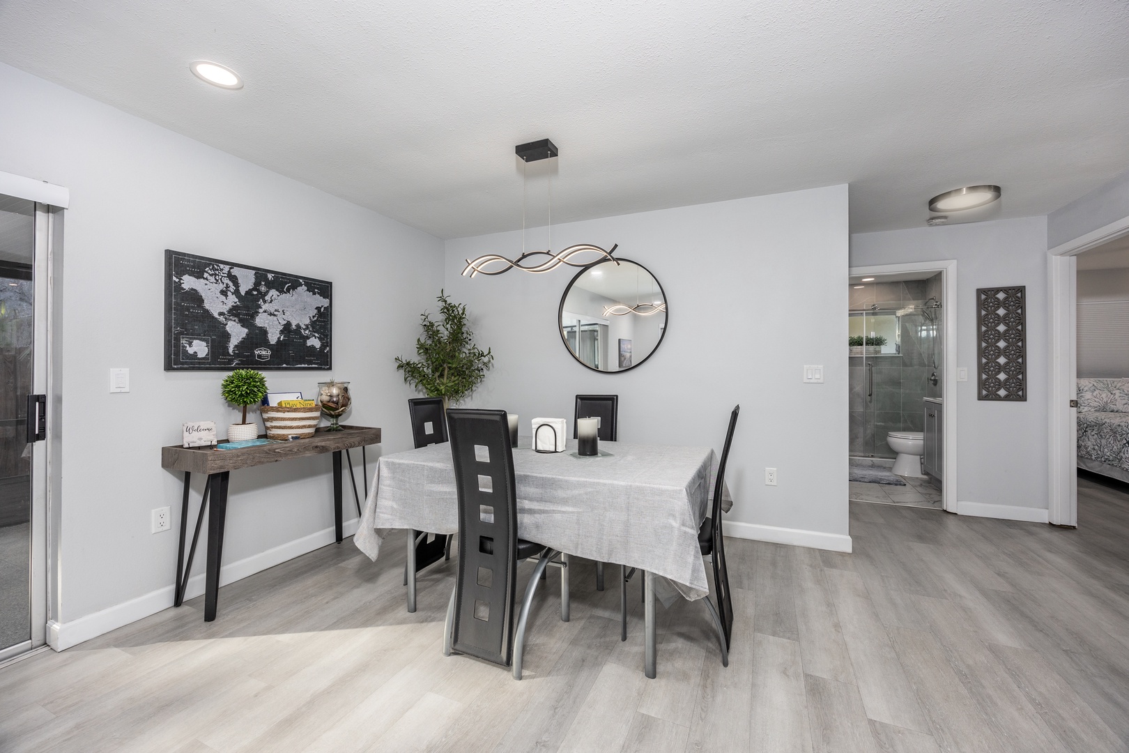 Gather around your stylish dining table for memorable meals, with modern décor creating the perfect ambiance for shared moments.