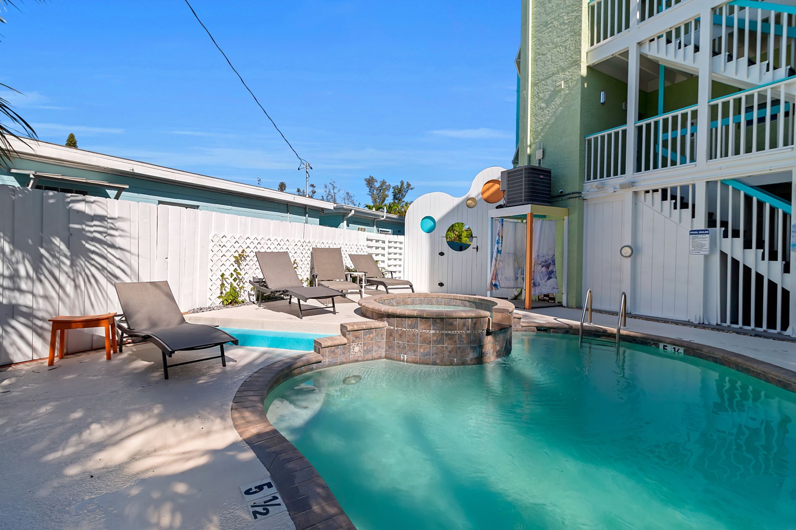 Sunny afternoons by the private pool are where vacation memories unfold—lounge on a chair, soak up the warmth, and let everyday worries drift away. Your perfect poolside hideaway awaits.
