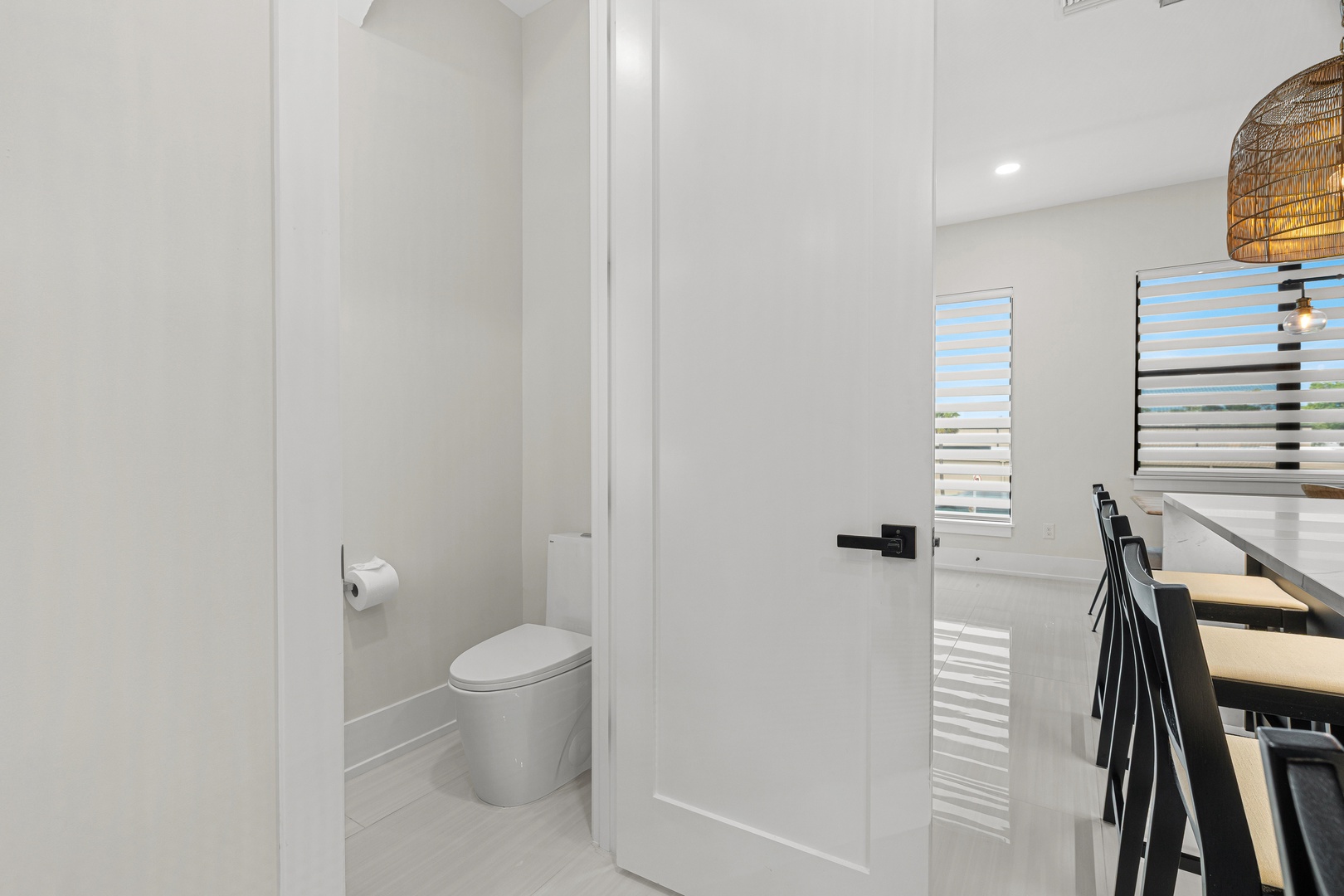 A bright, modern bathroom with fresh, clean lines and a private design—your comfortable home away from home.