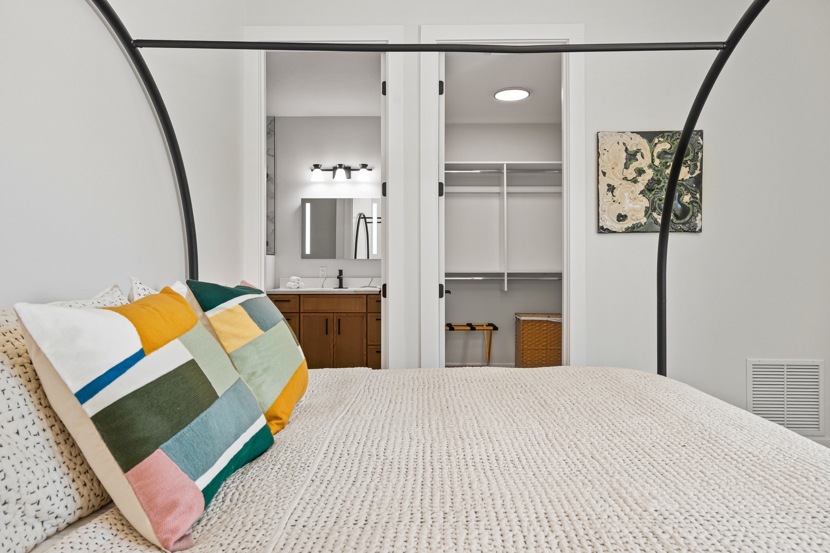 Sink into fresh linens in your private retreat, where modern comfort meets thoughtful design. Your ensuite and spacious closet await just steps away.