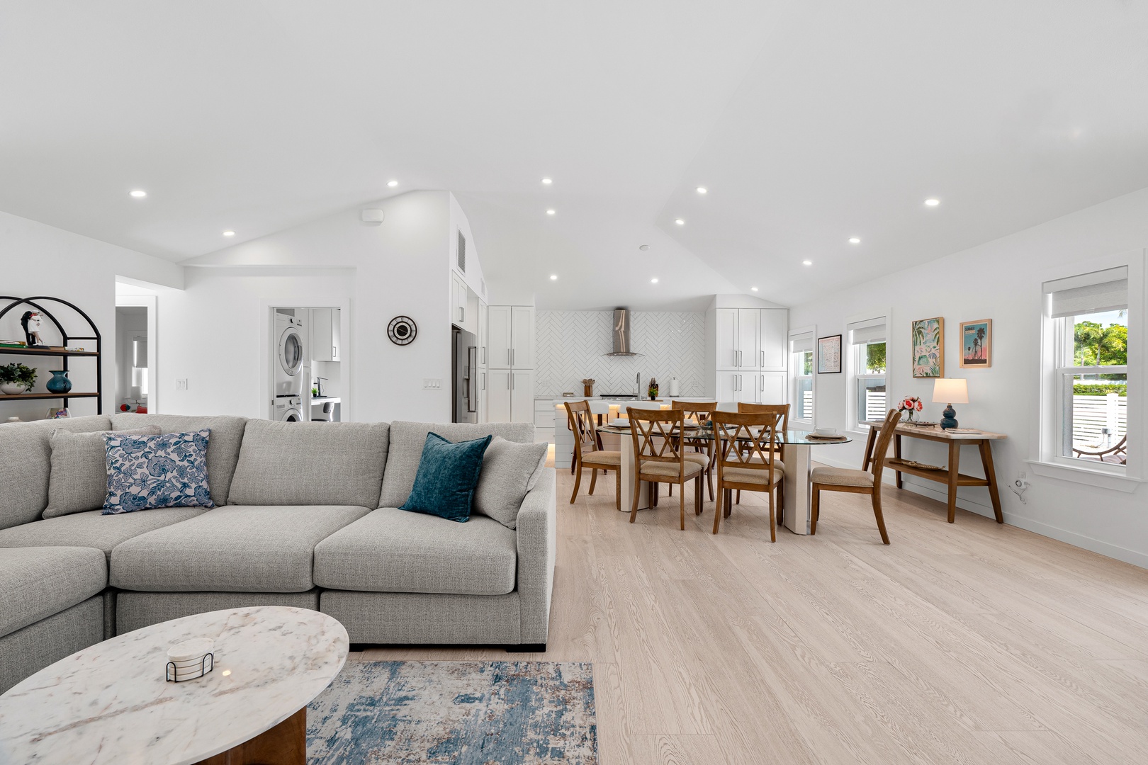 Relax in this bright, open living space where modern comfort meets coastal charm. The soft neutral palette and natural light create your perfect home base for vacation memories.