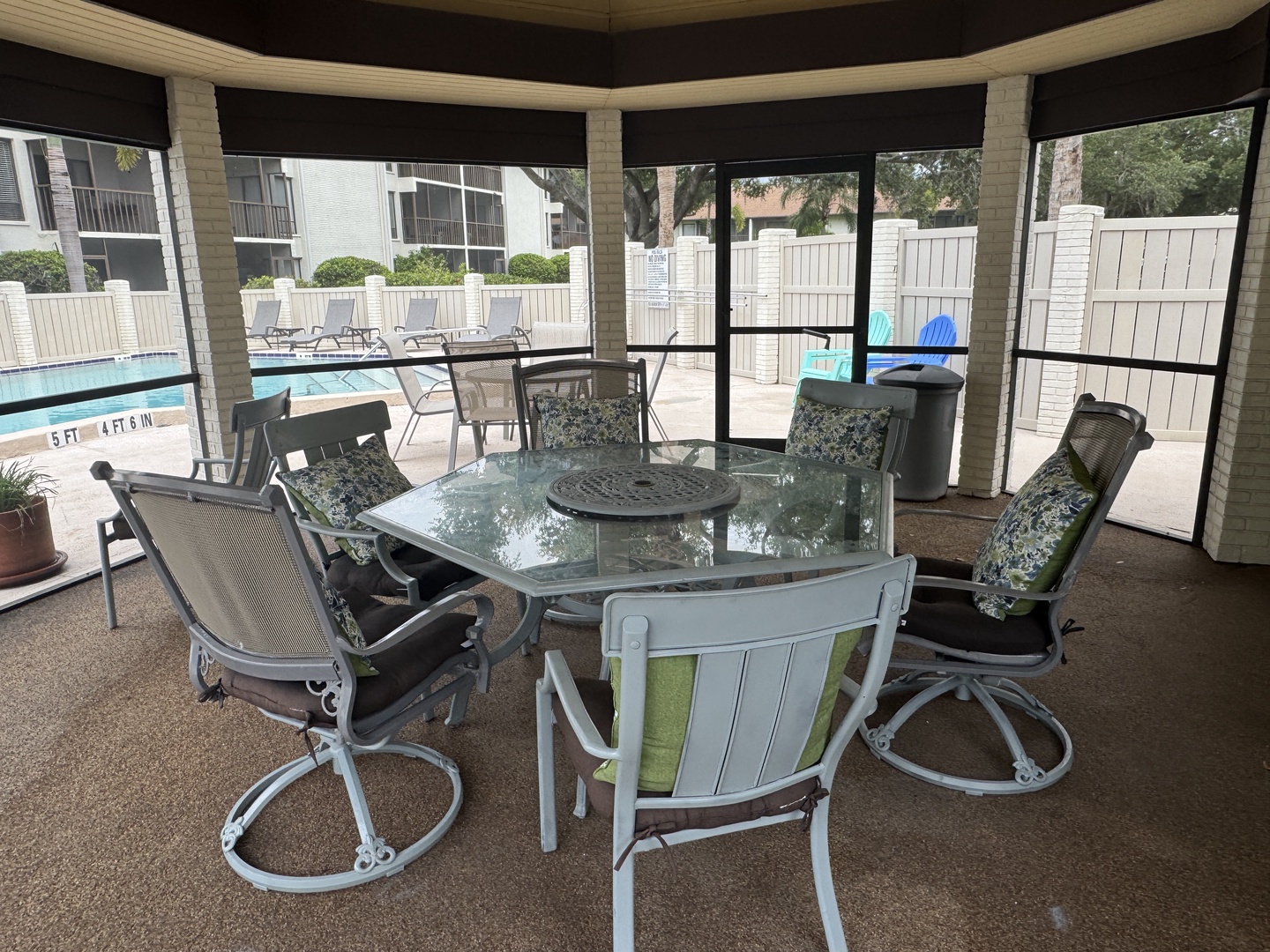 Enjoy the screened-in gazebo at the community pool. Great for dining al fresco after a fun swim.