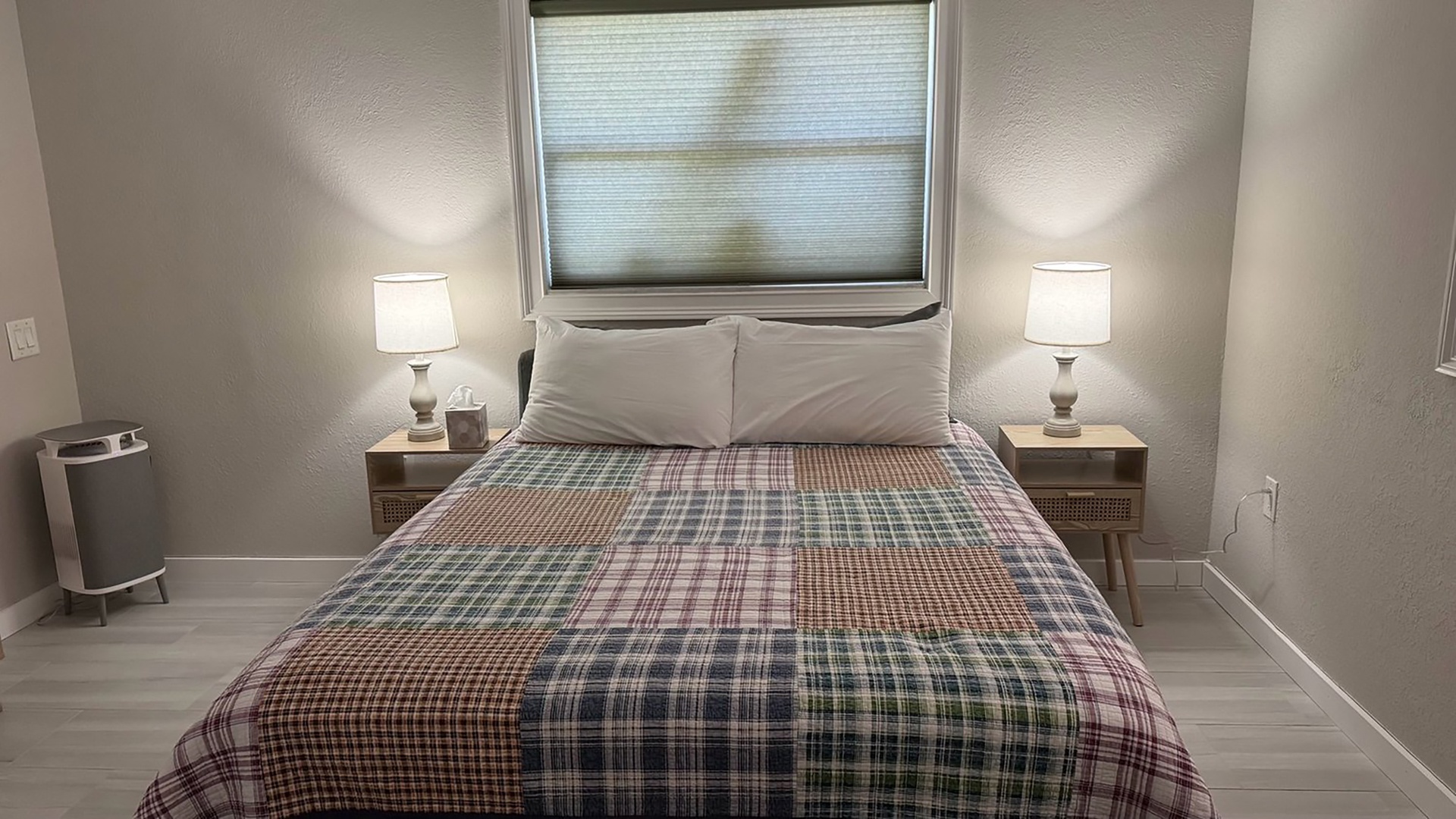 Primary bedroom, accent tables and lamps have been added for your comfort.
