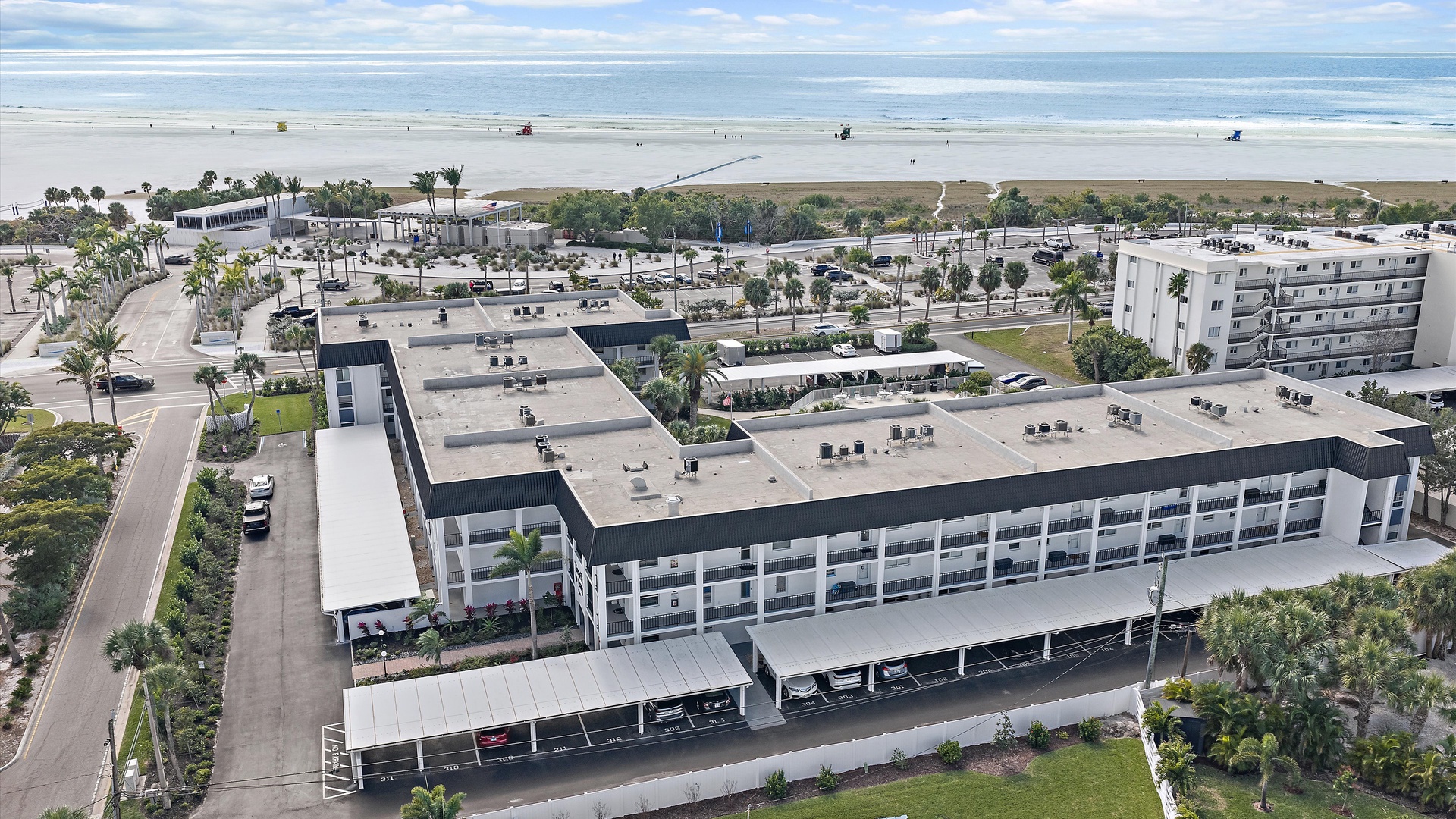 Beachfront property offering easy access to pristine sandy shores and ocean views in a vibrant coastal community.