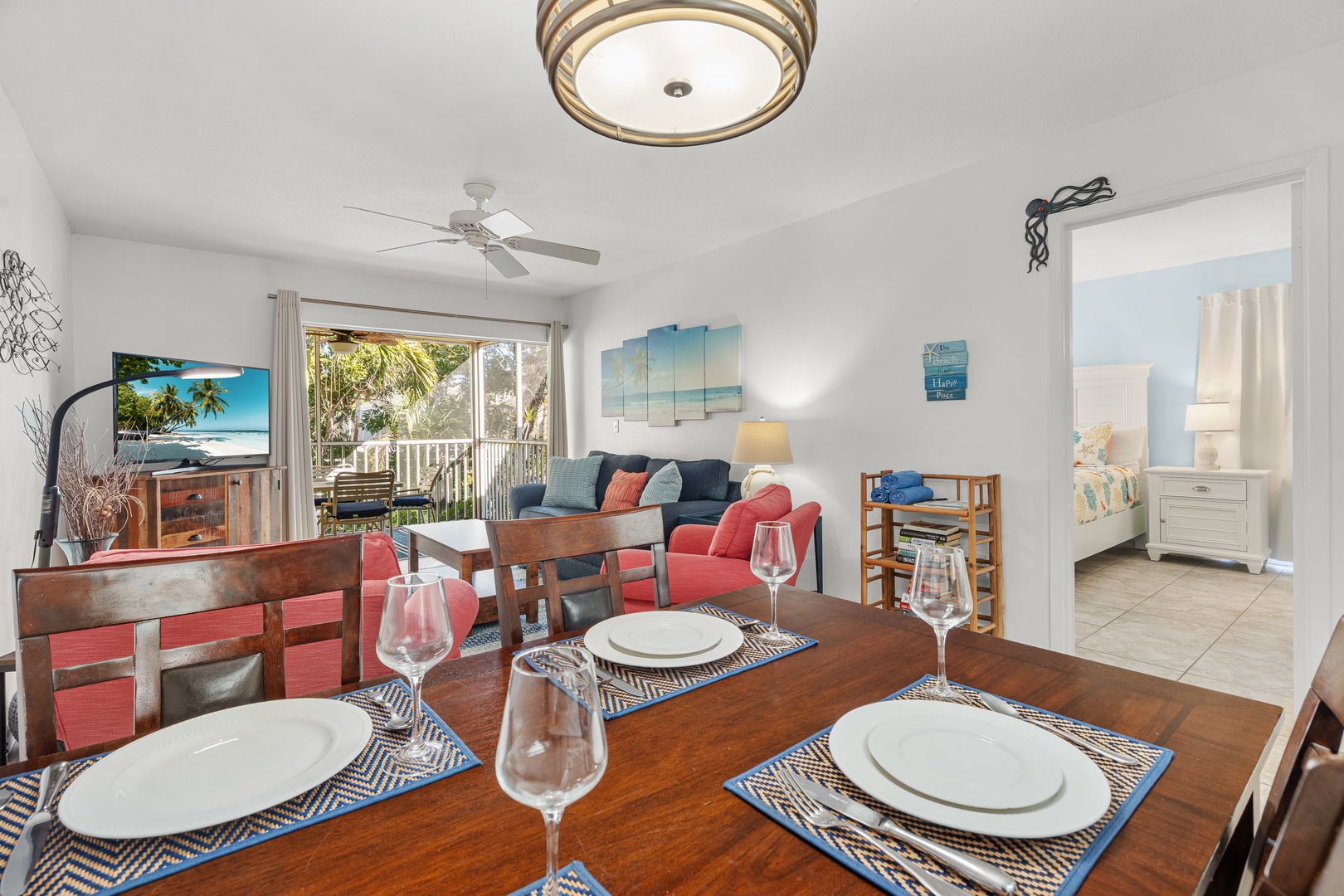 Elegant dining area overlooks main living space and patio.