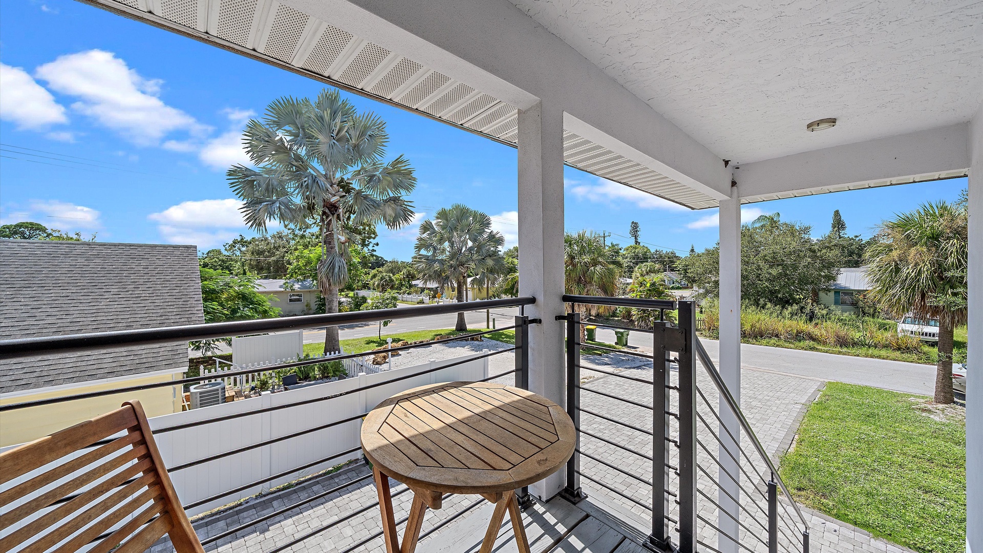 Step onto your private balcony and take in peaceful neighborhood views framed by swaying palms and Florida sunshine. A quiet spot to sip morning coffee and breathe in the tropical air.