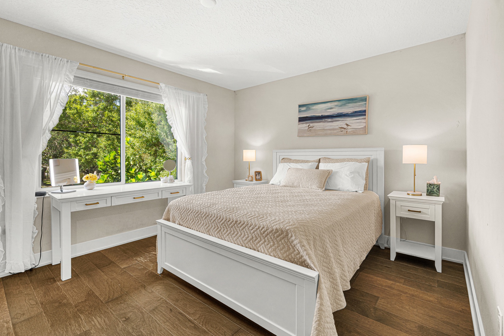Wake up to natural light streaming through your windows and refreshing garden views that bring the outdoors in. Crisp white linens and coastal touches create a serene sanctuary for restful nights.