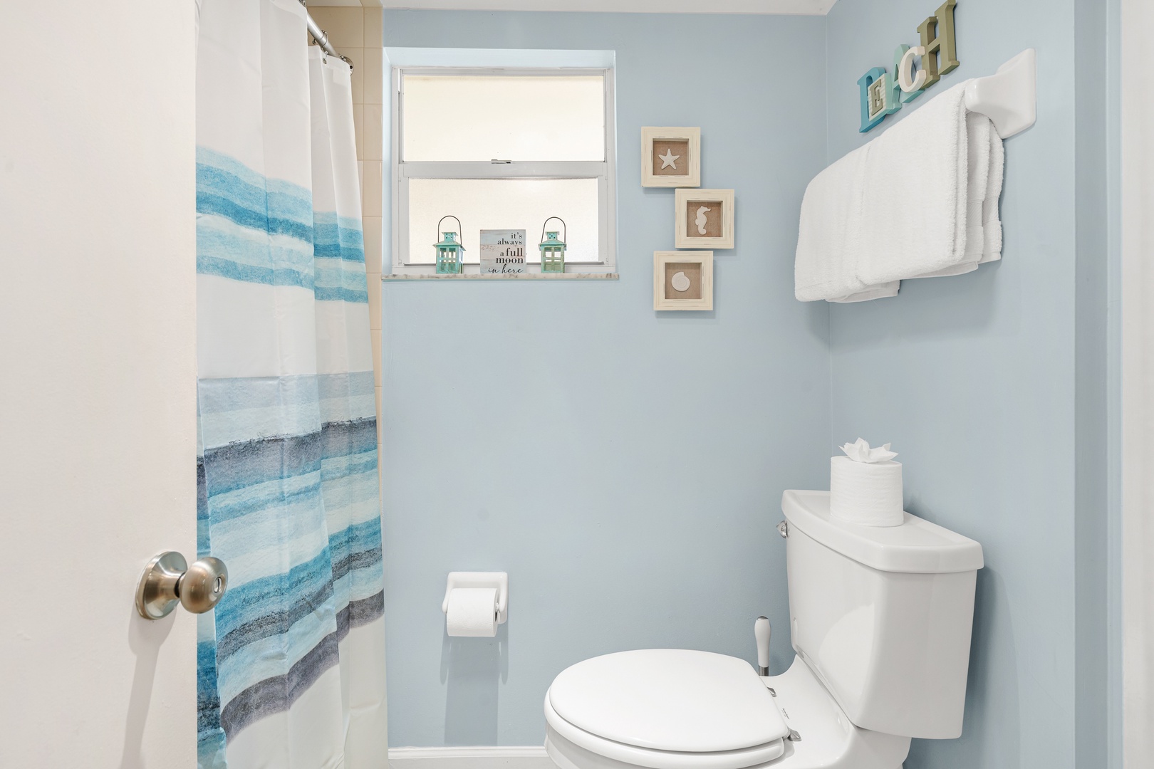 Ensuite bathroom with shower tub combo and private access.