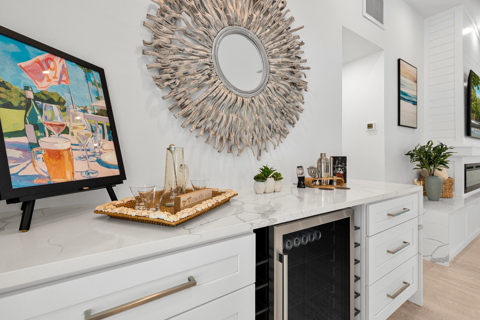 Your private bar awaits with elegant marble counters, wine storage, and a stylish setup for mixing your favorite drinks in this sophisticated space.
