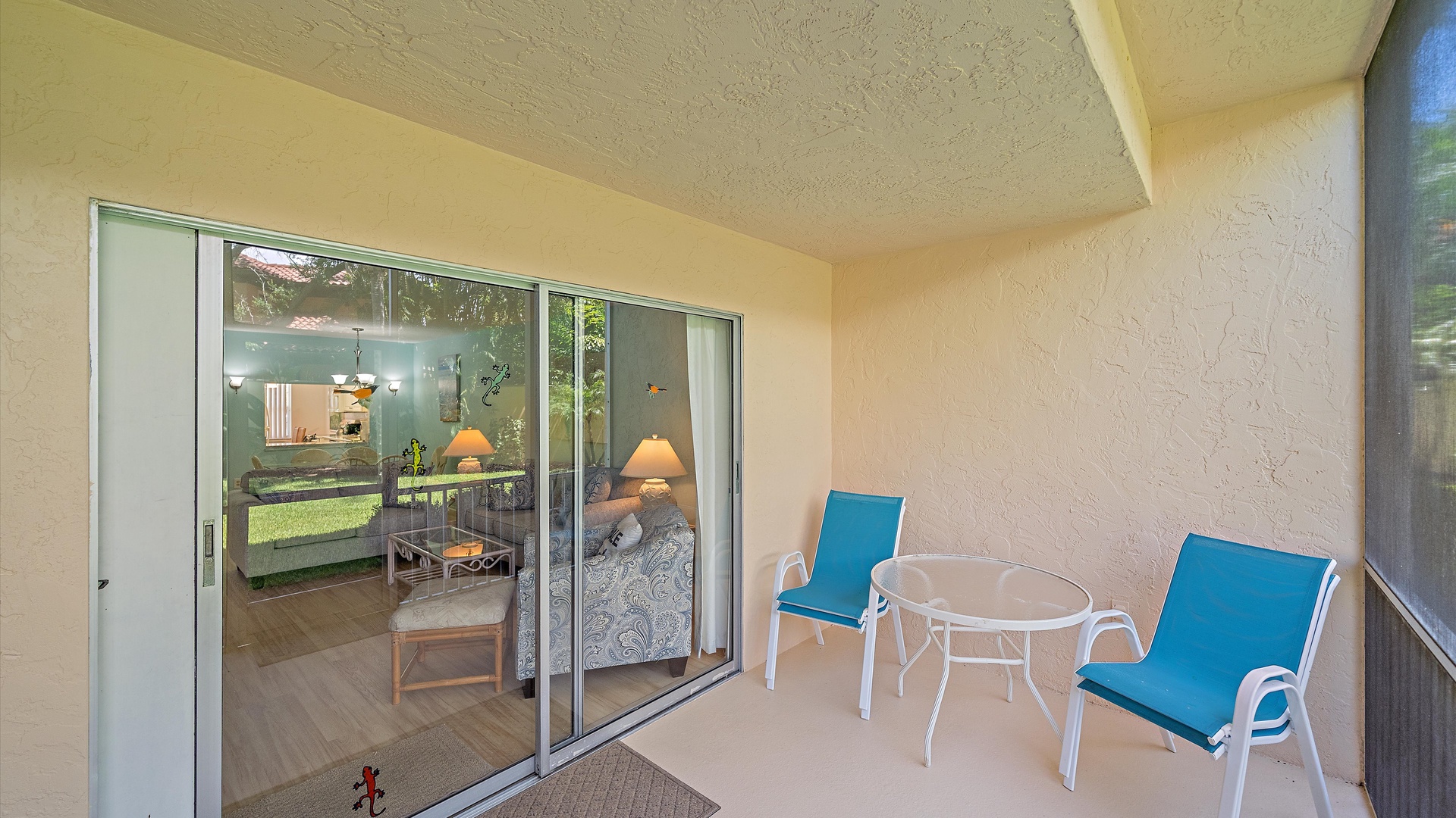 Your private covered balcony offers a peaceful retreat with comfortable seating where you can unwind and enjoy the gentle breeze after a day of exploring.