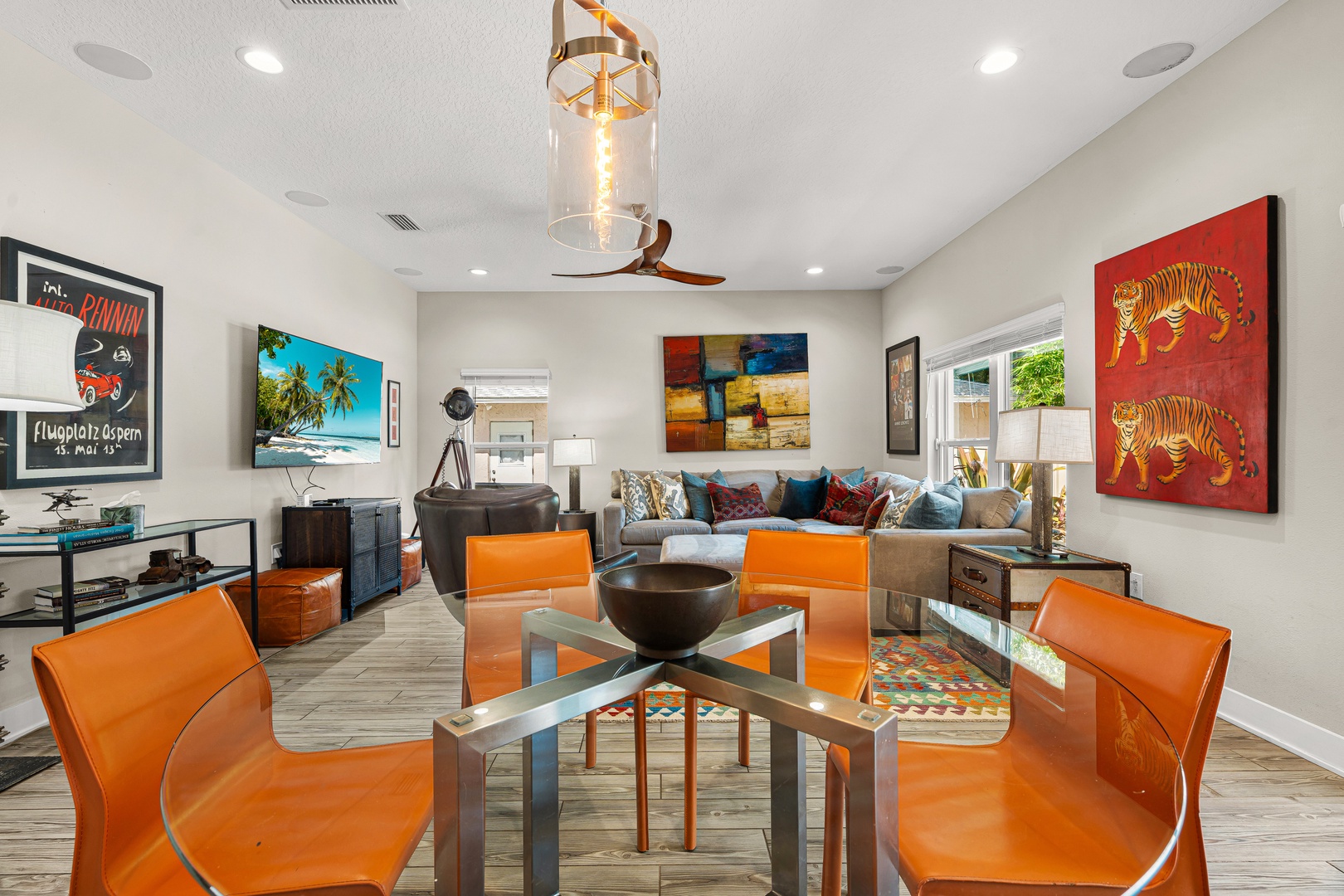 Step into your vibrant retreat where modern style meets comfort. Bold pops of color and eclectic art create an energetic yet inviting atmosphere perfect for gathering, relaxing, or simply enjoying your getaway.