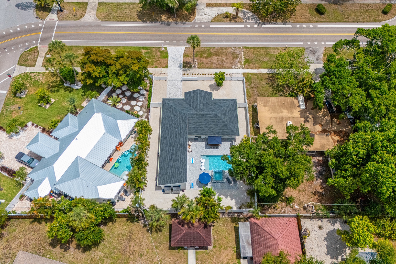 Aerial view of the home in a peaceful residential neighborhood.