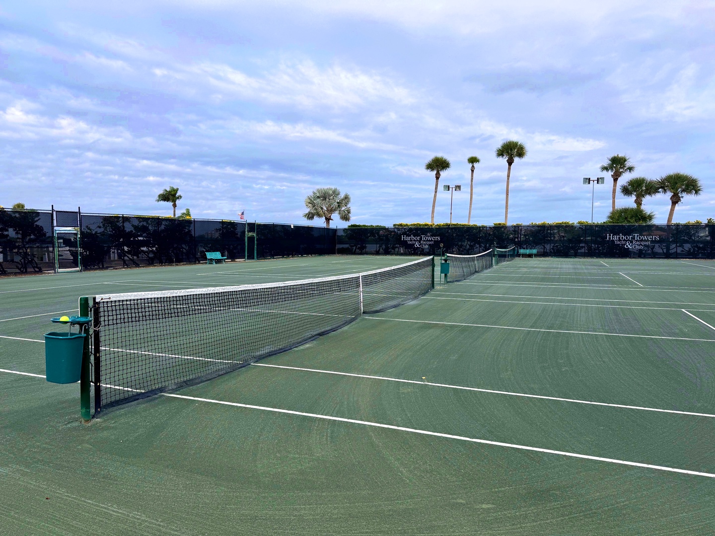 Perfect your serve on pristine tennis courts surrounded by tropical palms, where every match feels like a resort vacation.