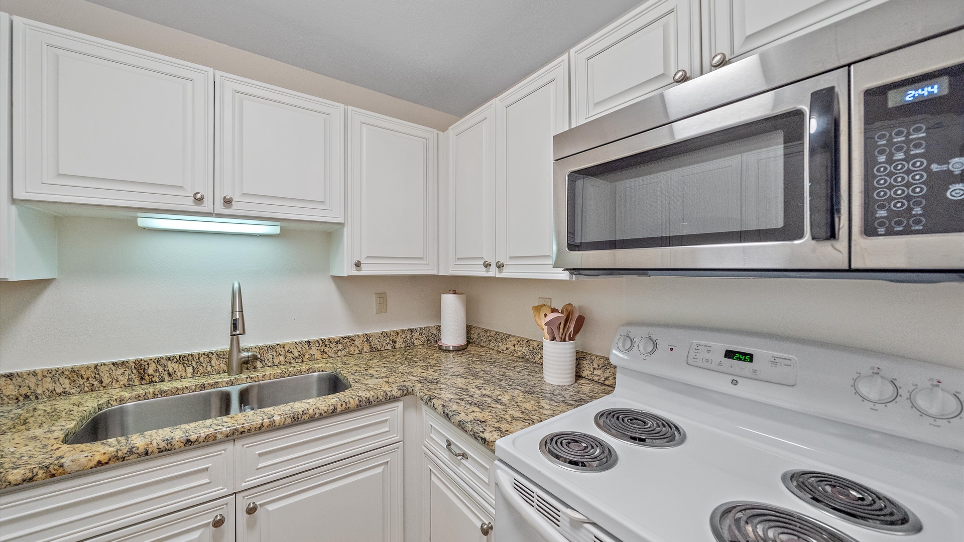 Your fully equipped kitchen features granite countertops, stainless steel appliances, and all the essentials you need to prepare meals during your stay.