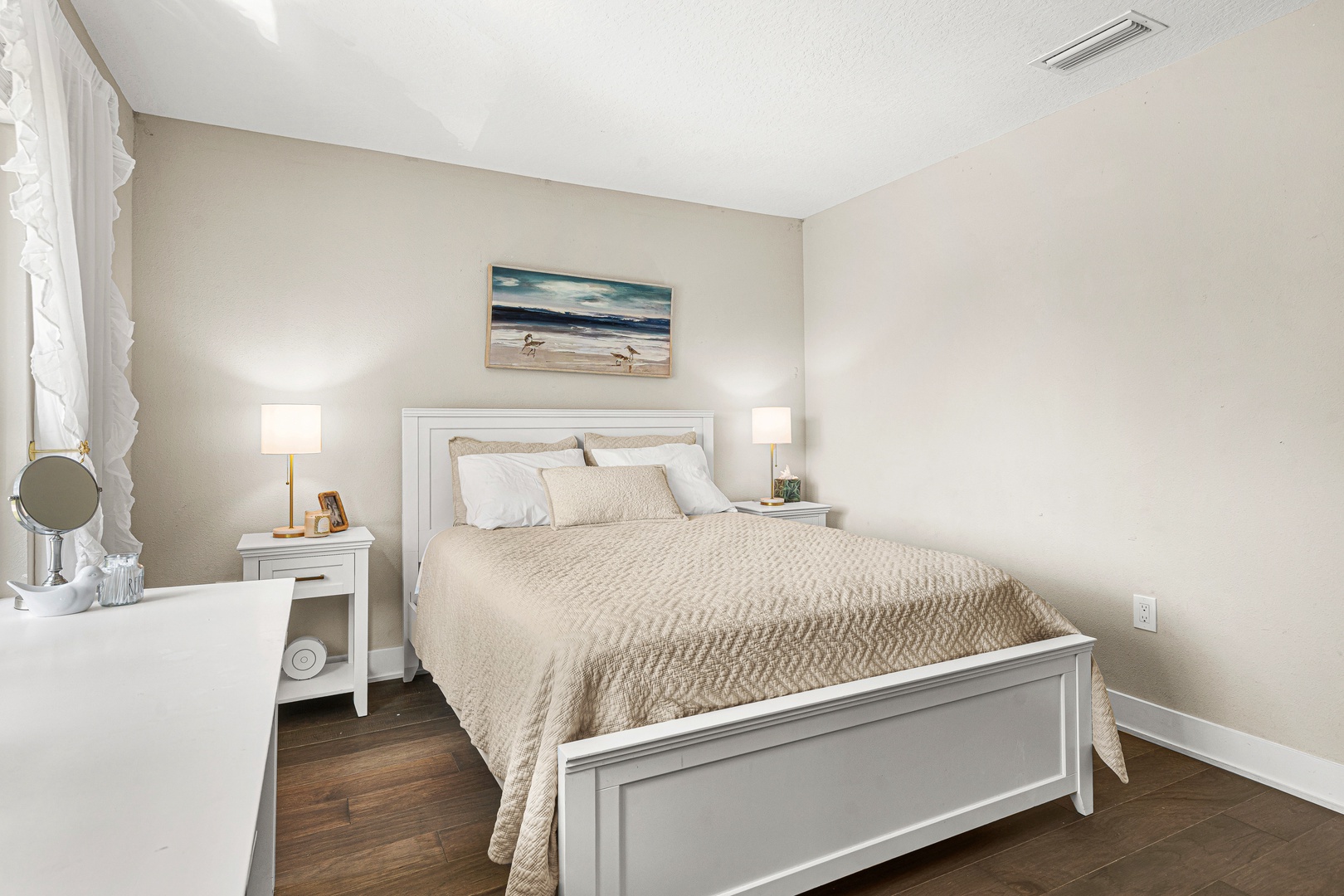 Sink into crisp linens and coastal calm. Your peaceful bedroom retreat features soft lighting and tranquil beach-inspired touches to help you unwind after a day of adventure.