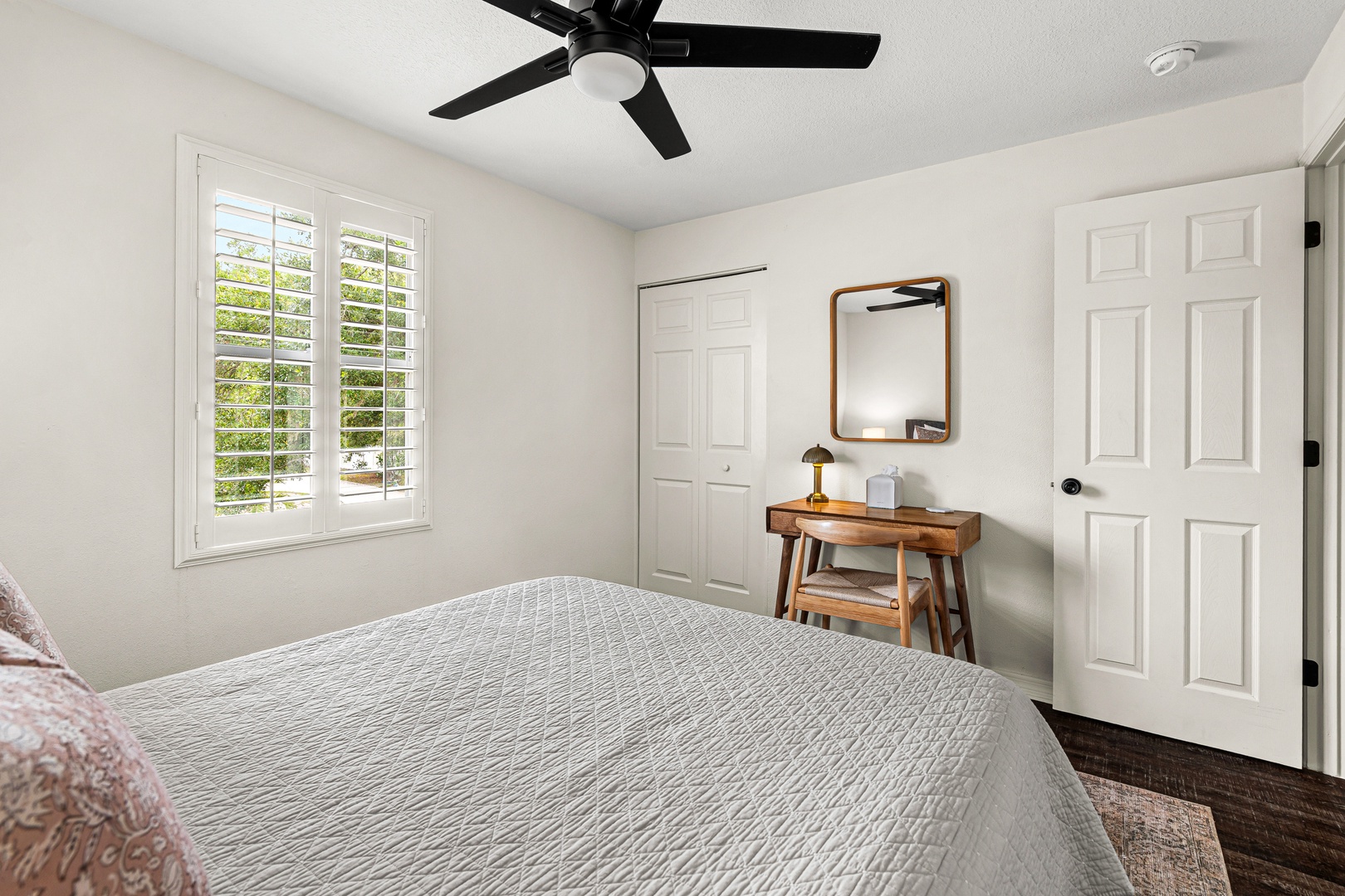 Your peaceful retreat awaits with crisp linens, natural light, and a stylish workspace where you can unwind and recharge in comfort.