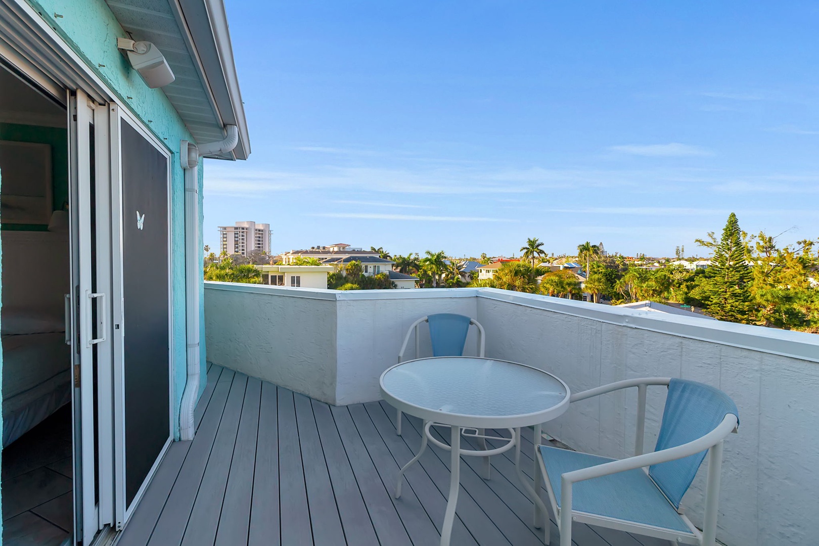 Step out onto your private balcony and enjoy morning coffee as tropical breezes carry the scent of palms and ocean air, surrounded by sunny Florida skies.
