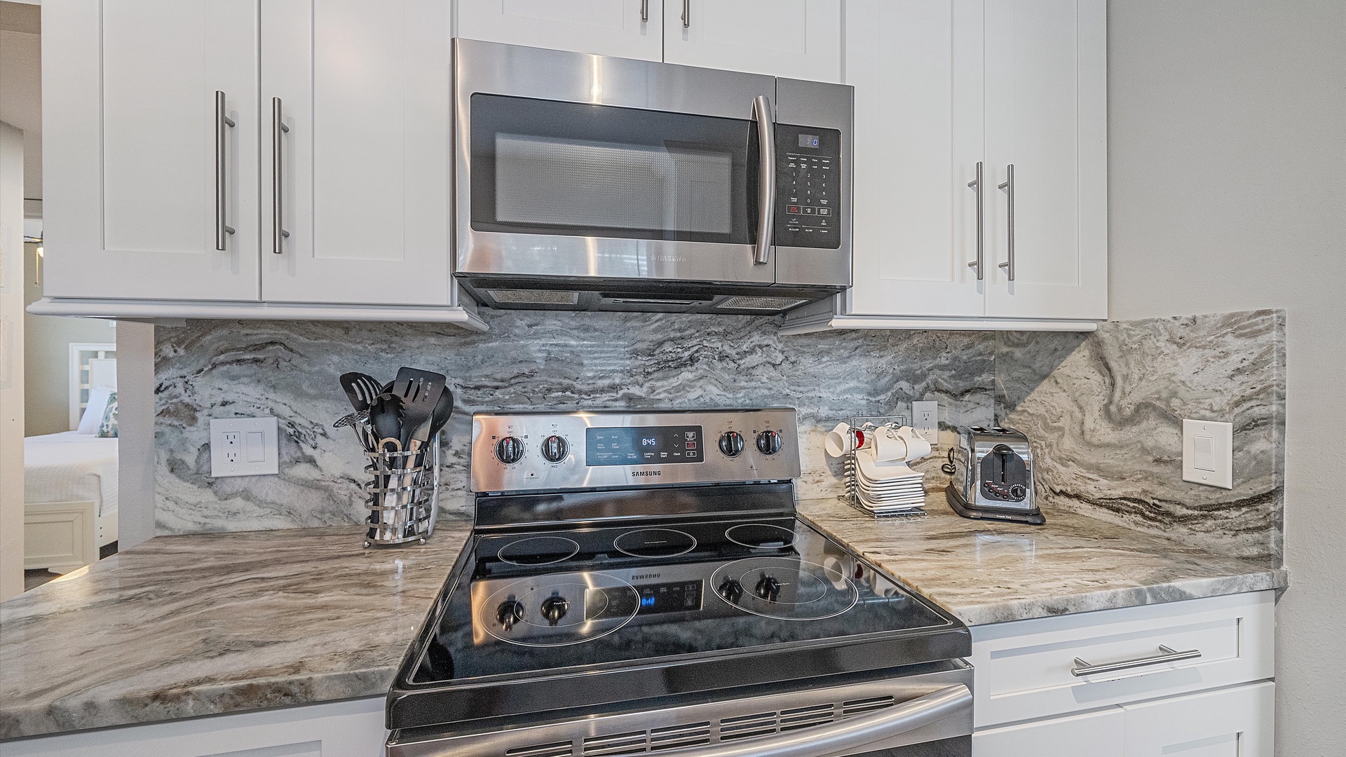 Your fully equipped kitchen features sleek stainless appliances, gleaming granite counters, and everything you need to prepare meals together during your getaway.