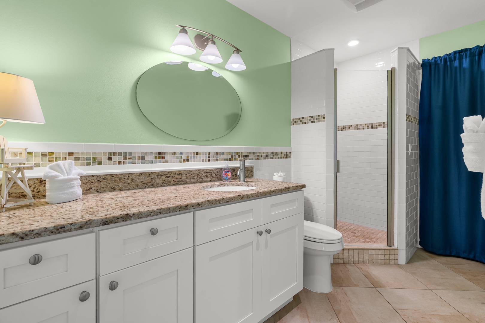 Walk-in shower, plush bath towels, and bathroom starter essentials for your stay.