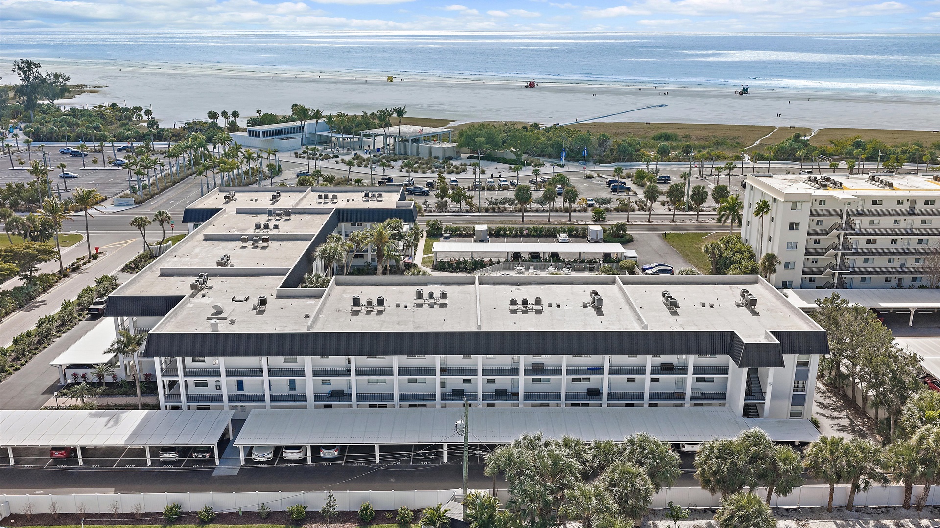 Modern beachfront property offers stunning coastal access with expansive sandy shores and ocean views just steps away.