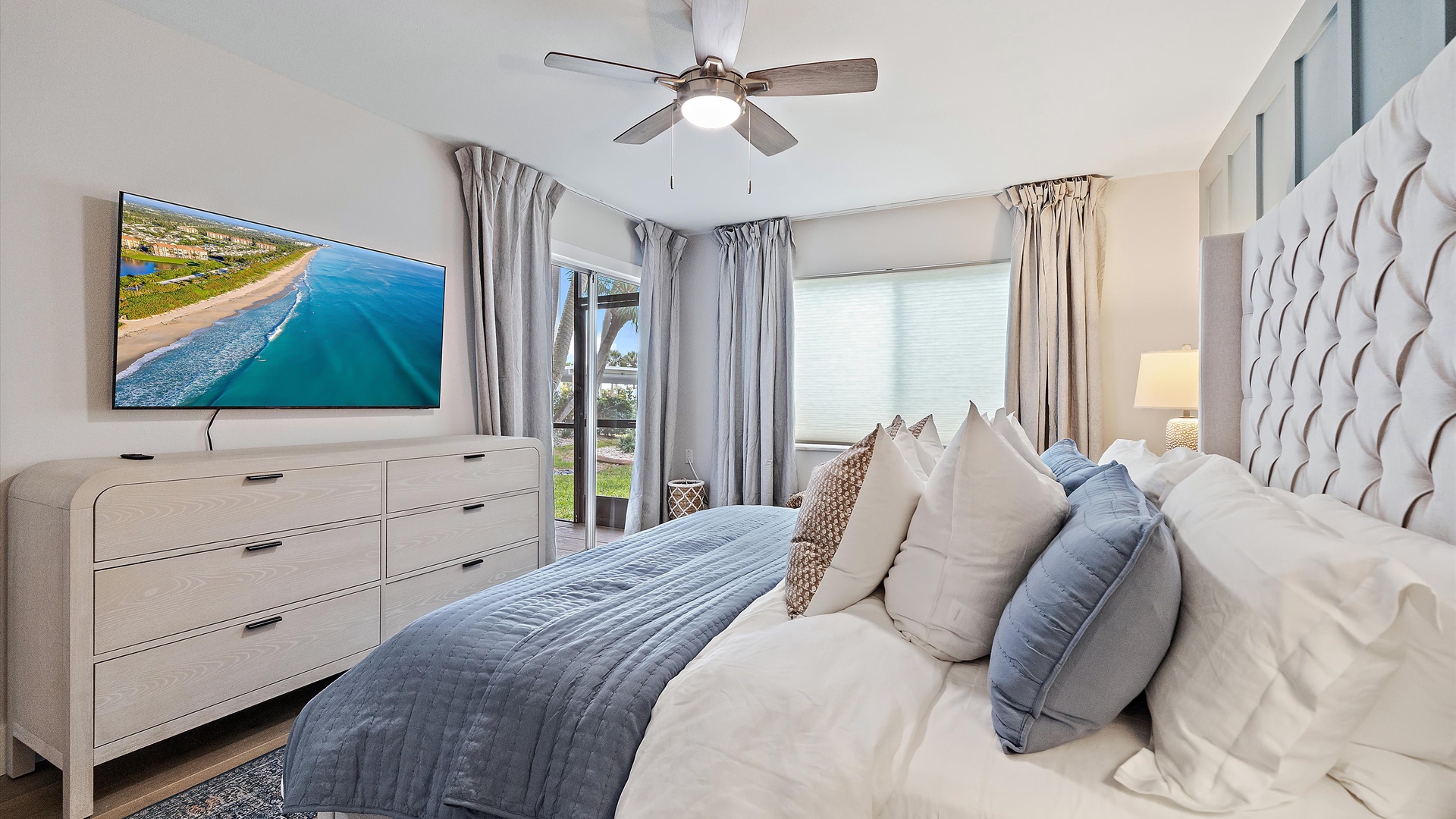 Your coastal retreat features a plush bed with ocean-inspired linens, perfect for restful nights after beach days.