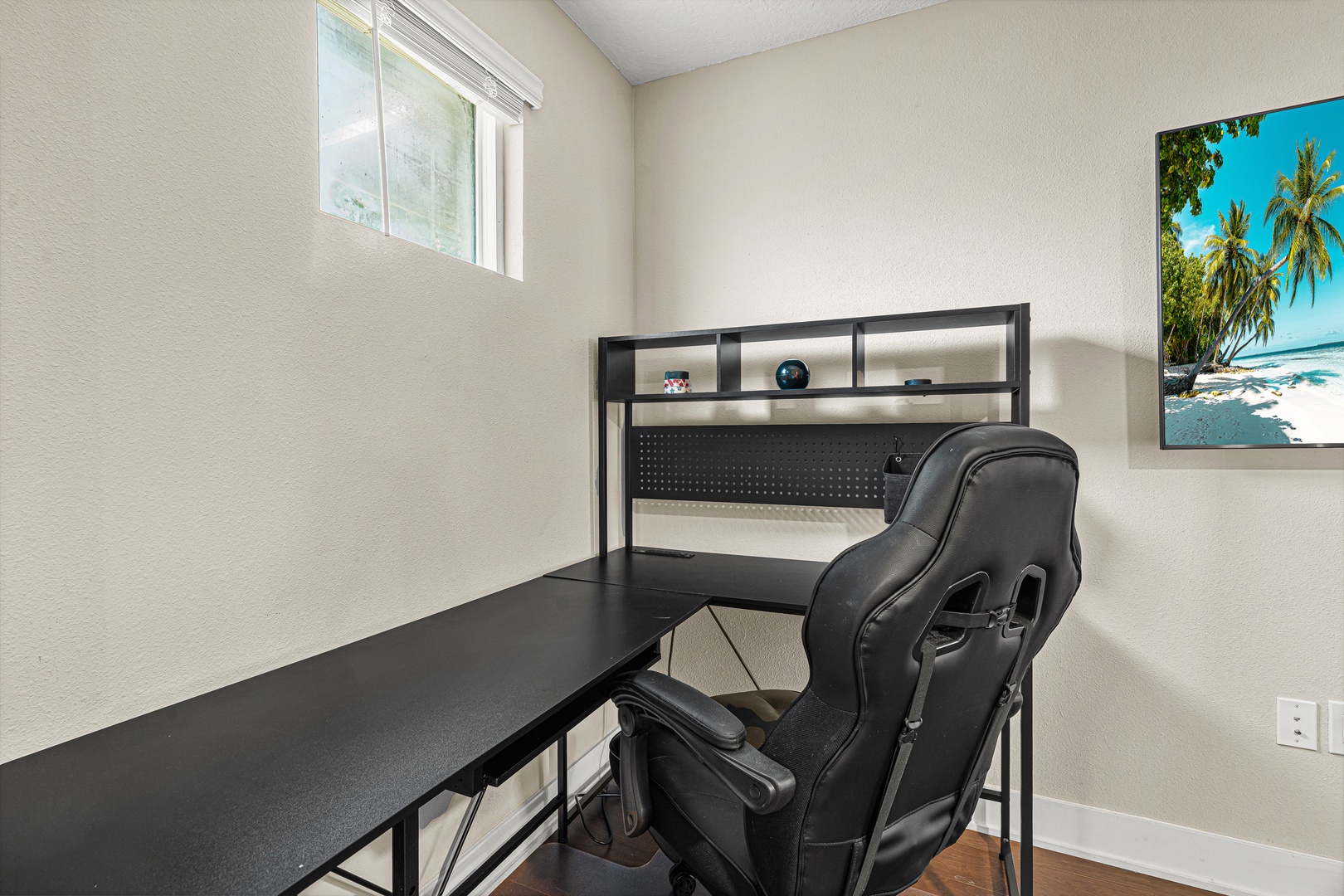 Your dedicated workspace awaits—settle into the ergonomic chair, let natural light lift your spirits, and get down to business with a sleek desk that keeps you productive and focused.