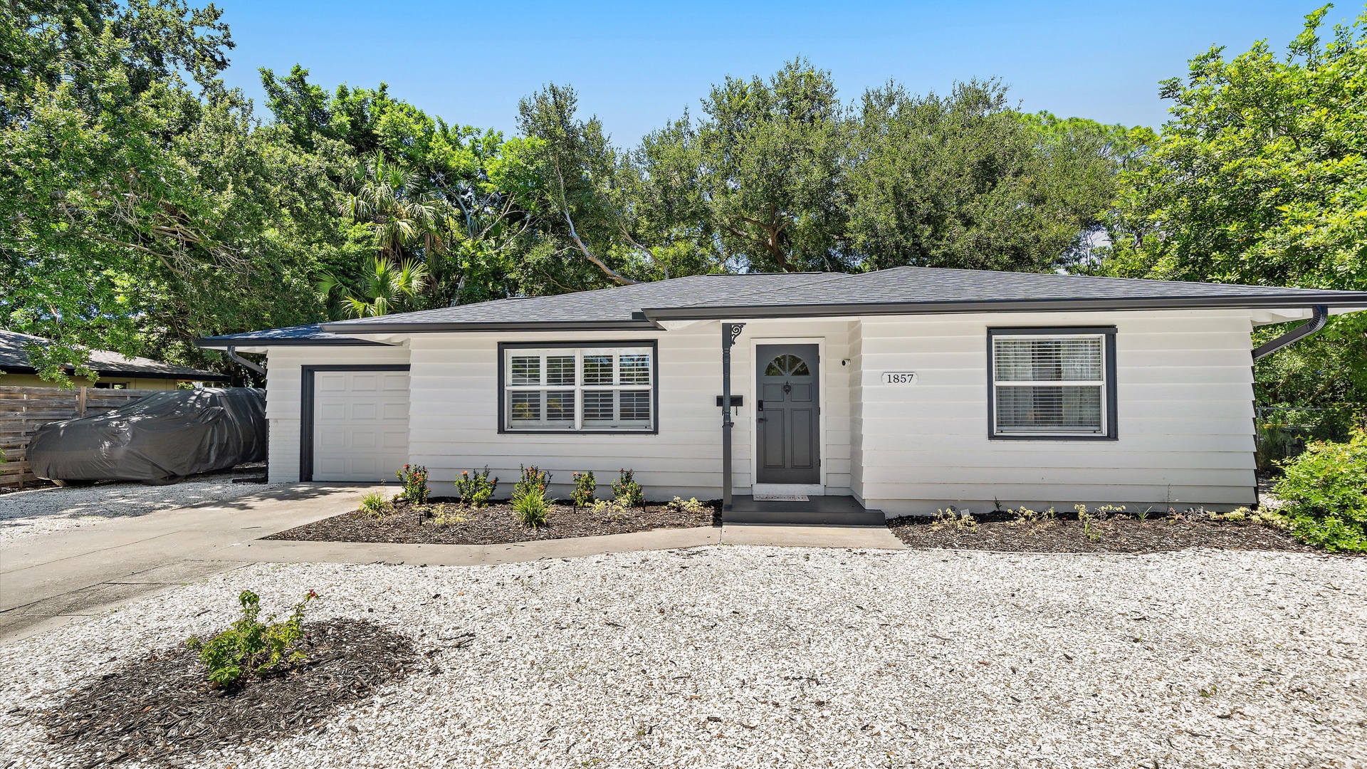 This freshly updated property sits quietly among mature trees with easy parking and a welcoming front entrance, marking the start of your getaway.