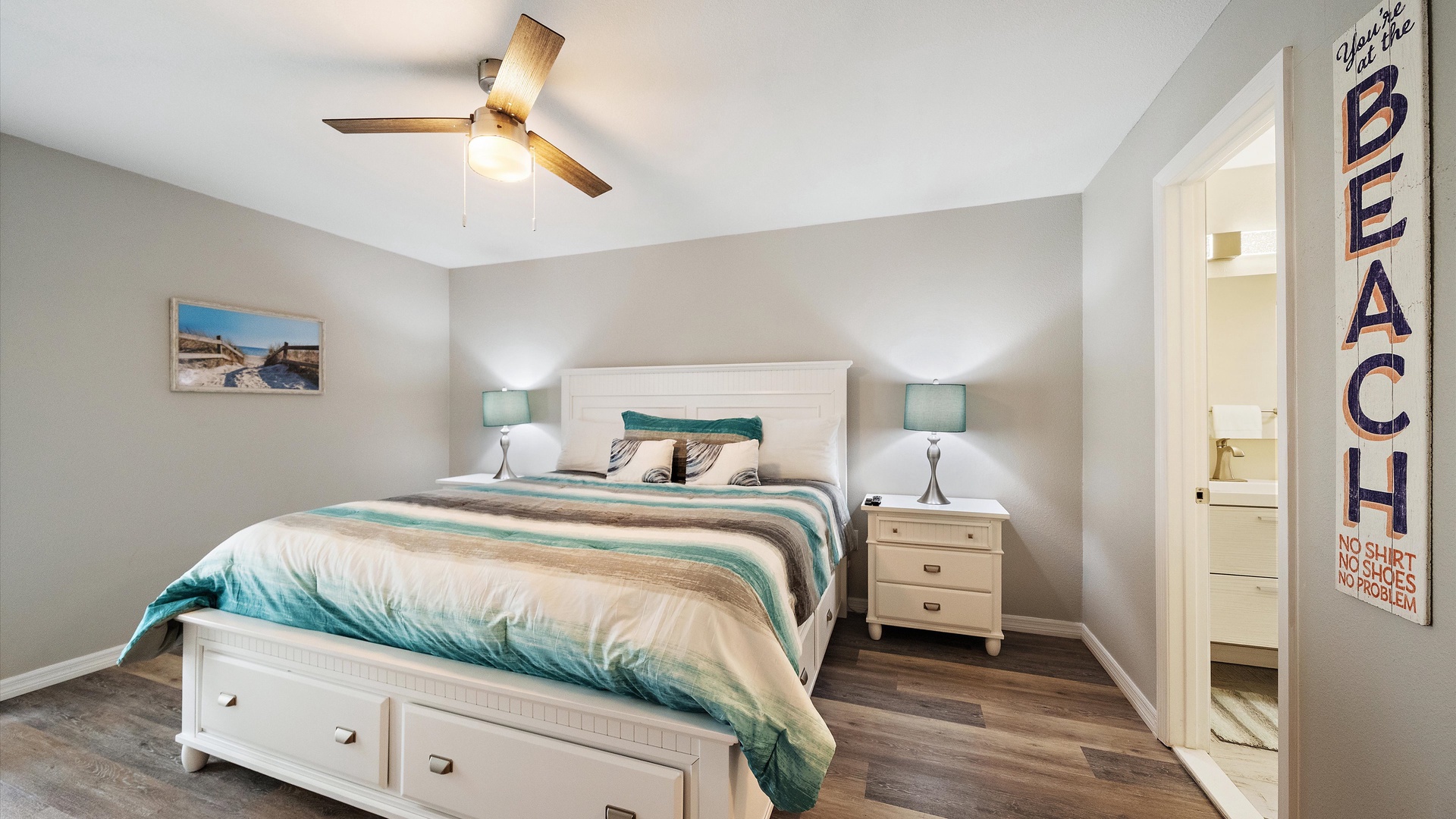 Slip into your coastal-themed retreat where breezy beach vibes meet restful comfort. The soothing palette and thoughtful touches create a tranquil sanctuary for your getaway.