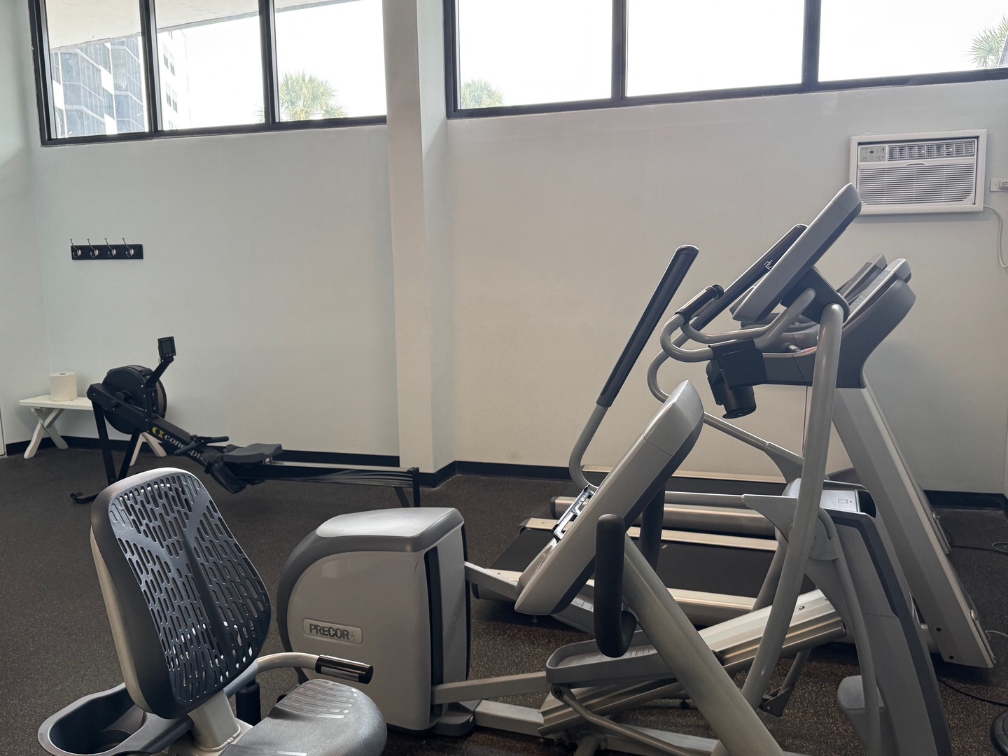 Your private fitness center awaits with cardio equipment and city views to energize your workout routine.