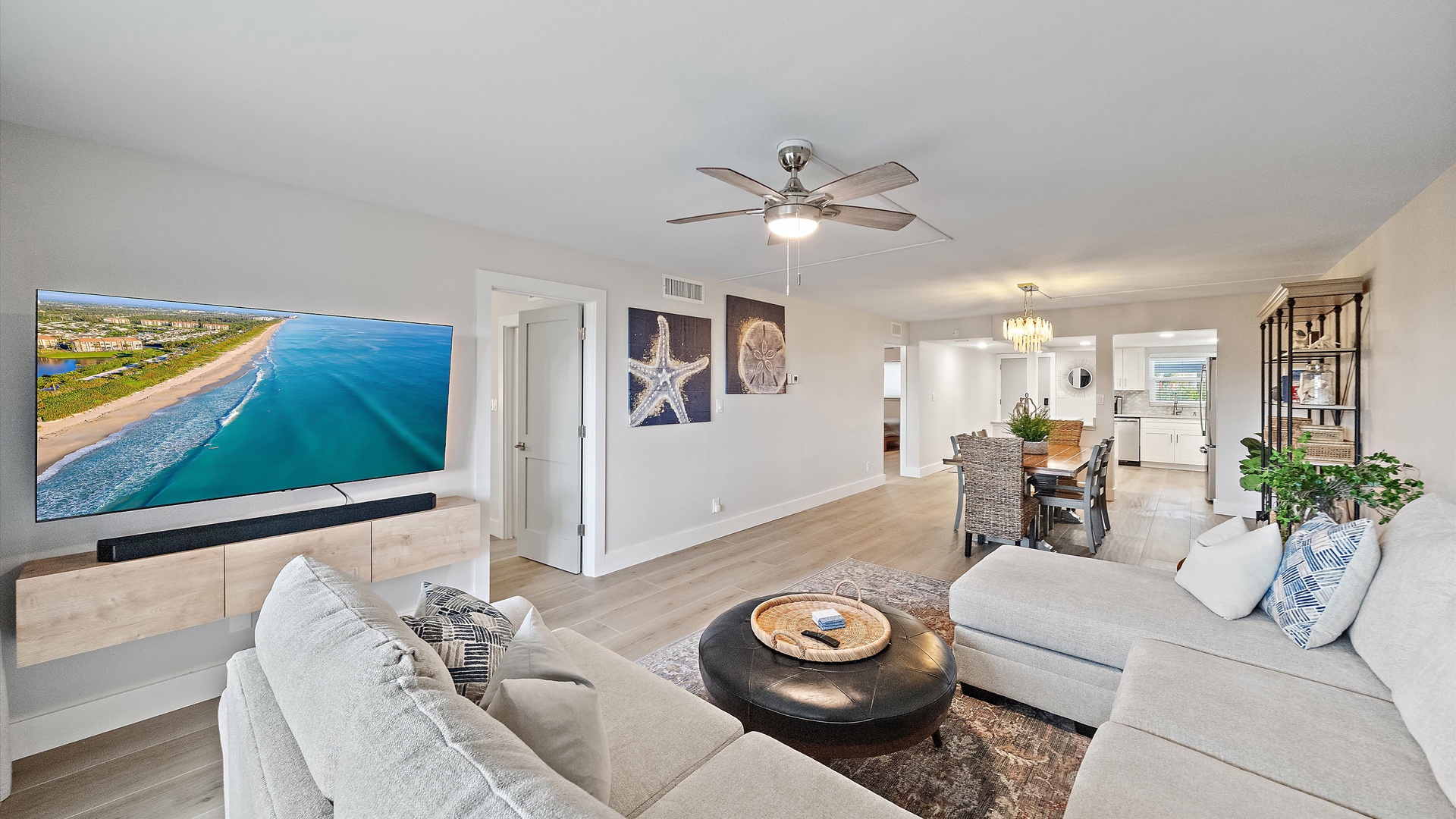 Relax in your bright, open living space with plush seating and coastal charm, complete with modern entertainment for cozy nights in.