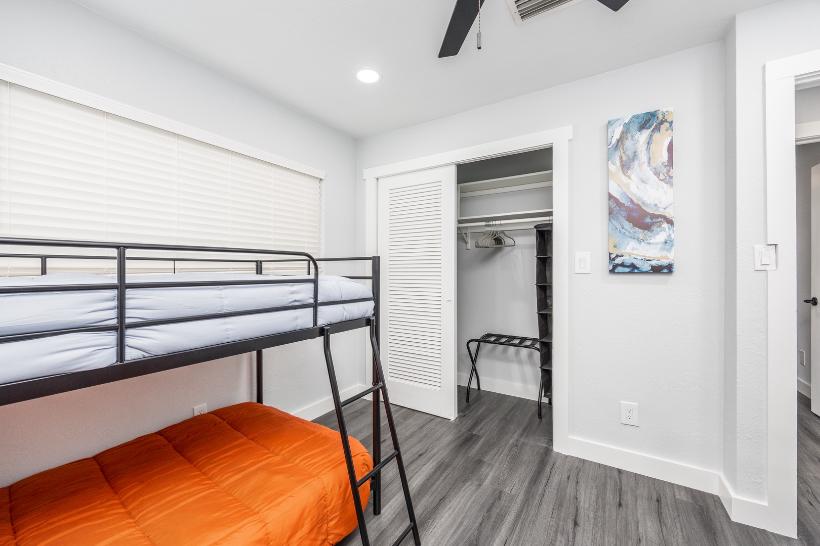 You'll love the bunk bed room with its spacious closet and modern touches - perfect for families or groups seeking comfortable shared sleeping.