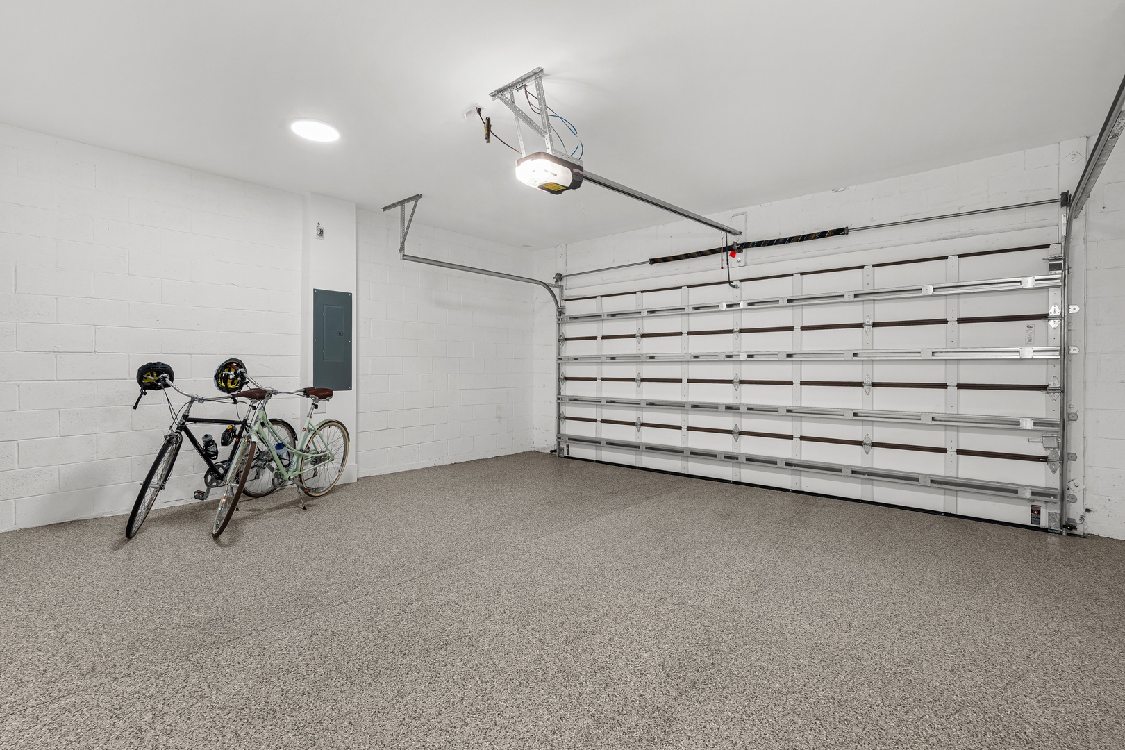 Two car garage with direct access to condo. Beach chairs, umbrella, cooler and 2 bikes available in the garage