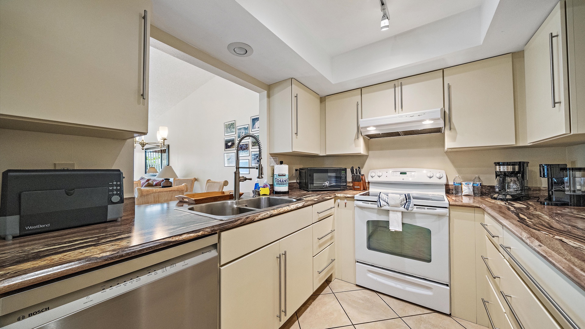 This bright, modern kitchen has everything you need to prepare delicious meals, with plenty of counter space and appliances ready for your culinary adventures during your stay.