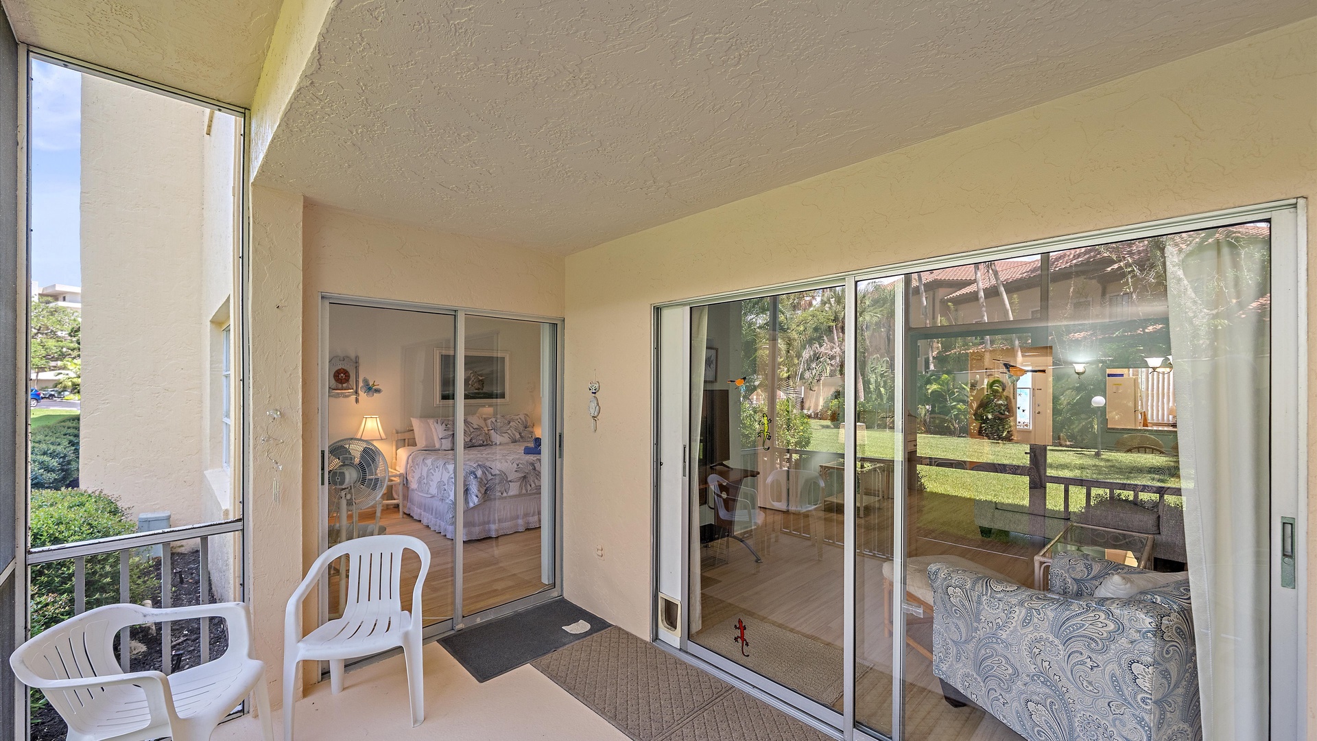 Your covered balcony opens to garden views and invites you to relax with morning coffee or unwind after exploring the area.